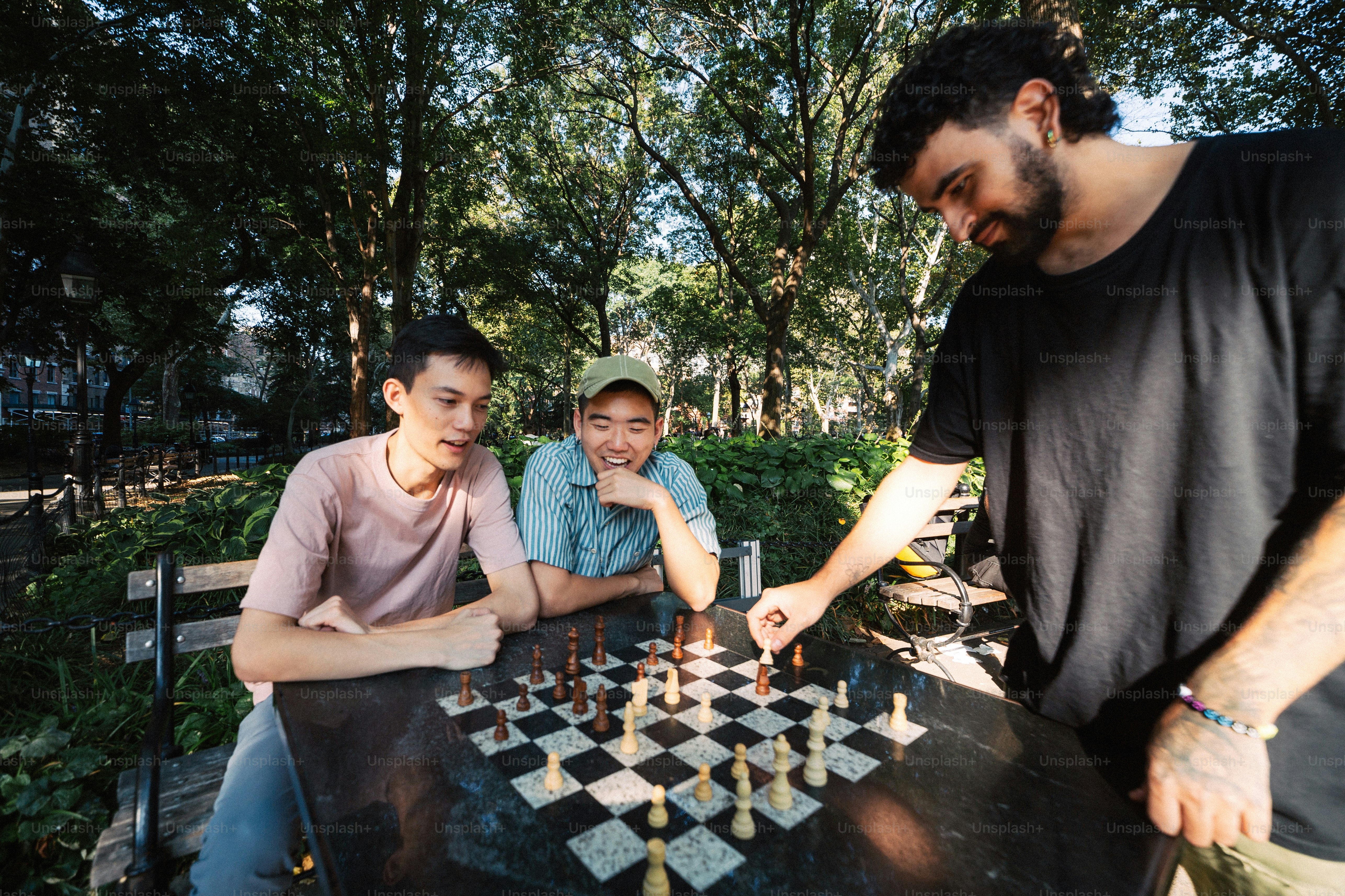 A group of people playing a game of chess