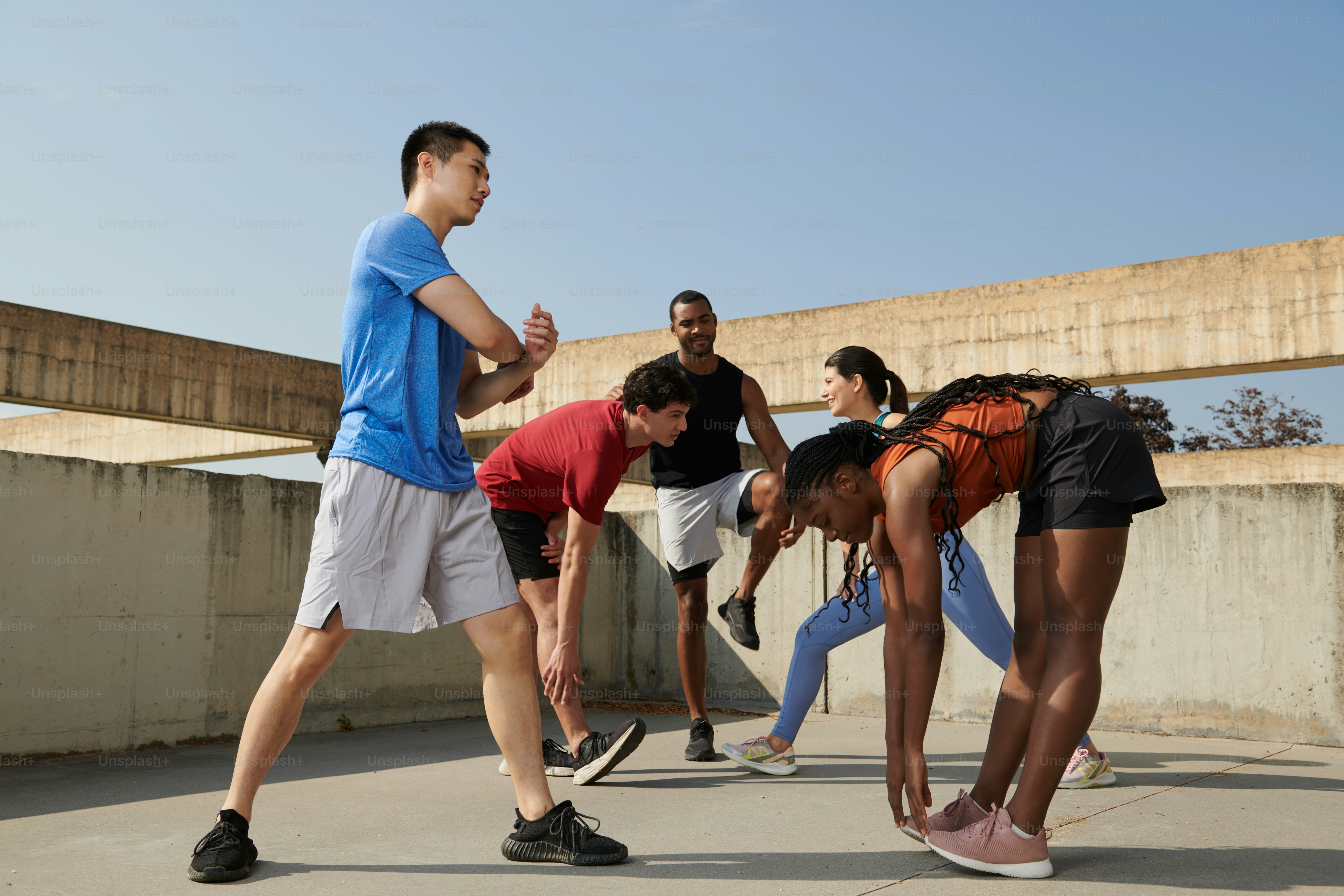 A group of people walking up some steps photo – Fitness Image on Unsplash