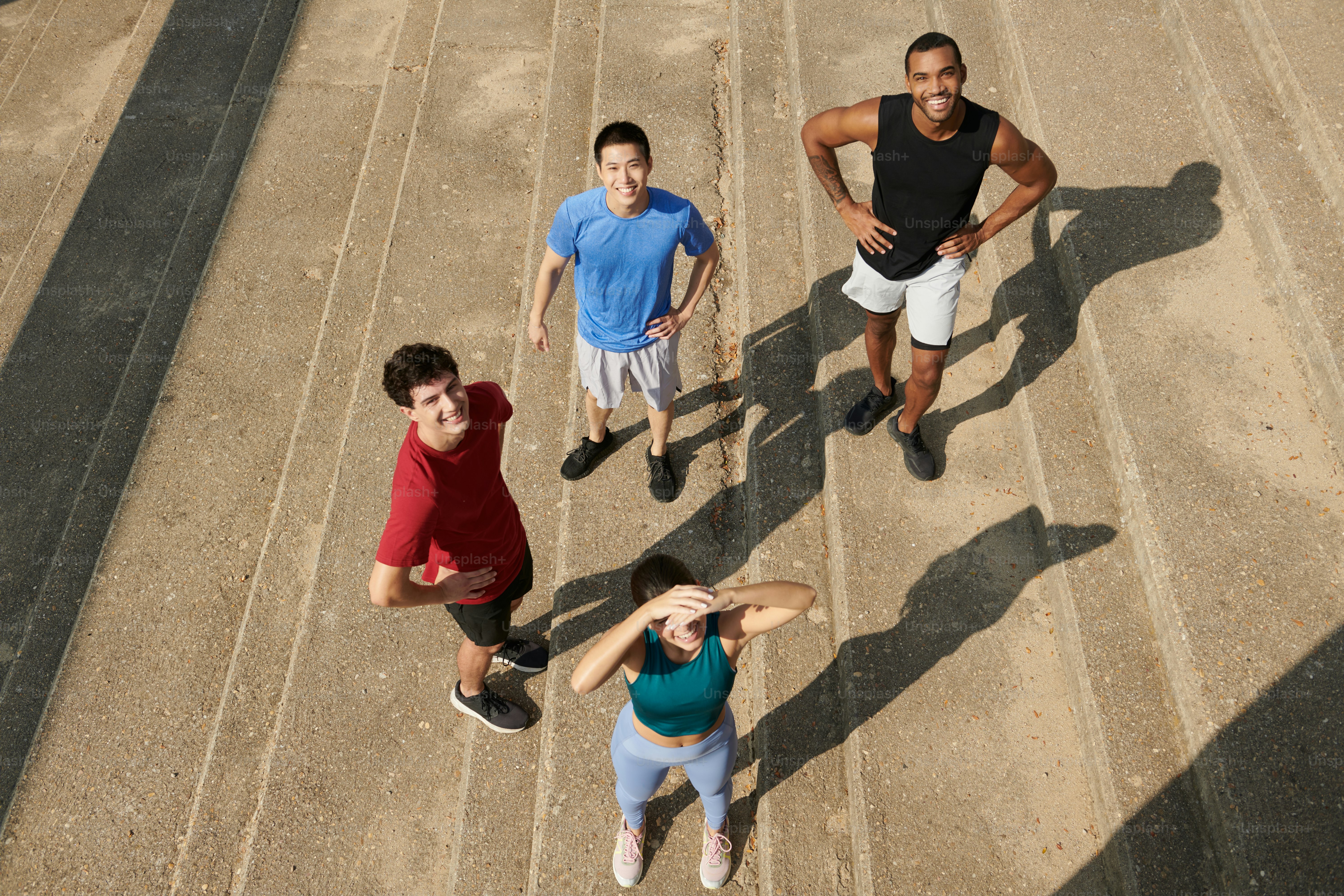 A group of people walking up some stairs photo – Fitness Image on Unsplash