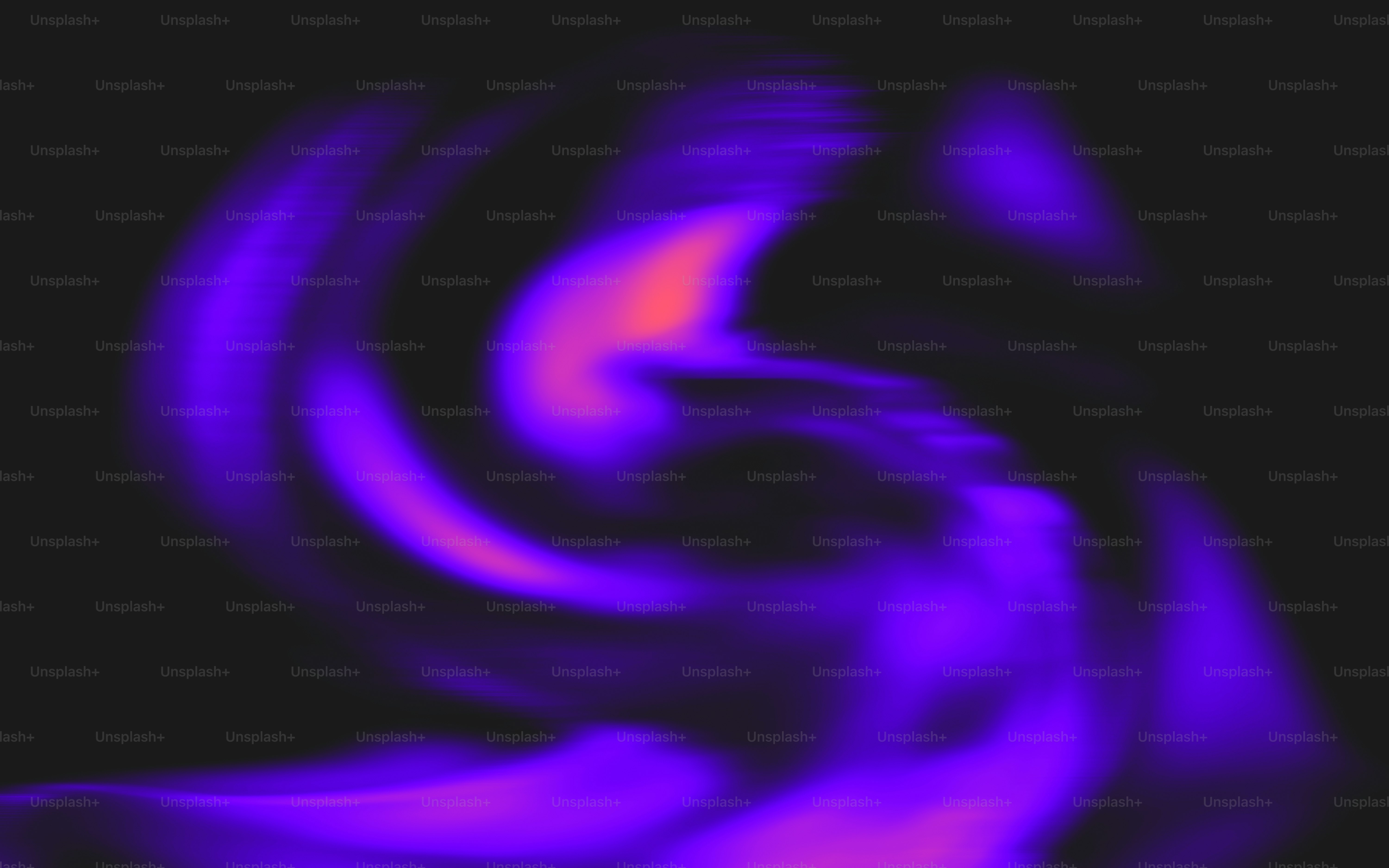 Ein verschwommenes Bild eines violetten Wirbels auf schwarzem Hintergrund