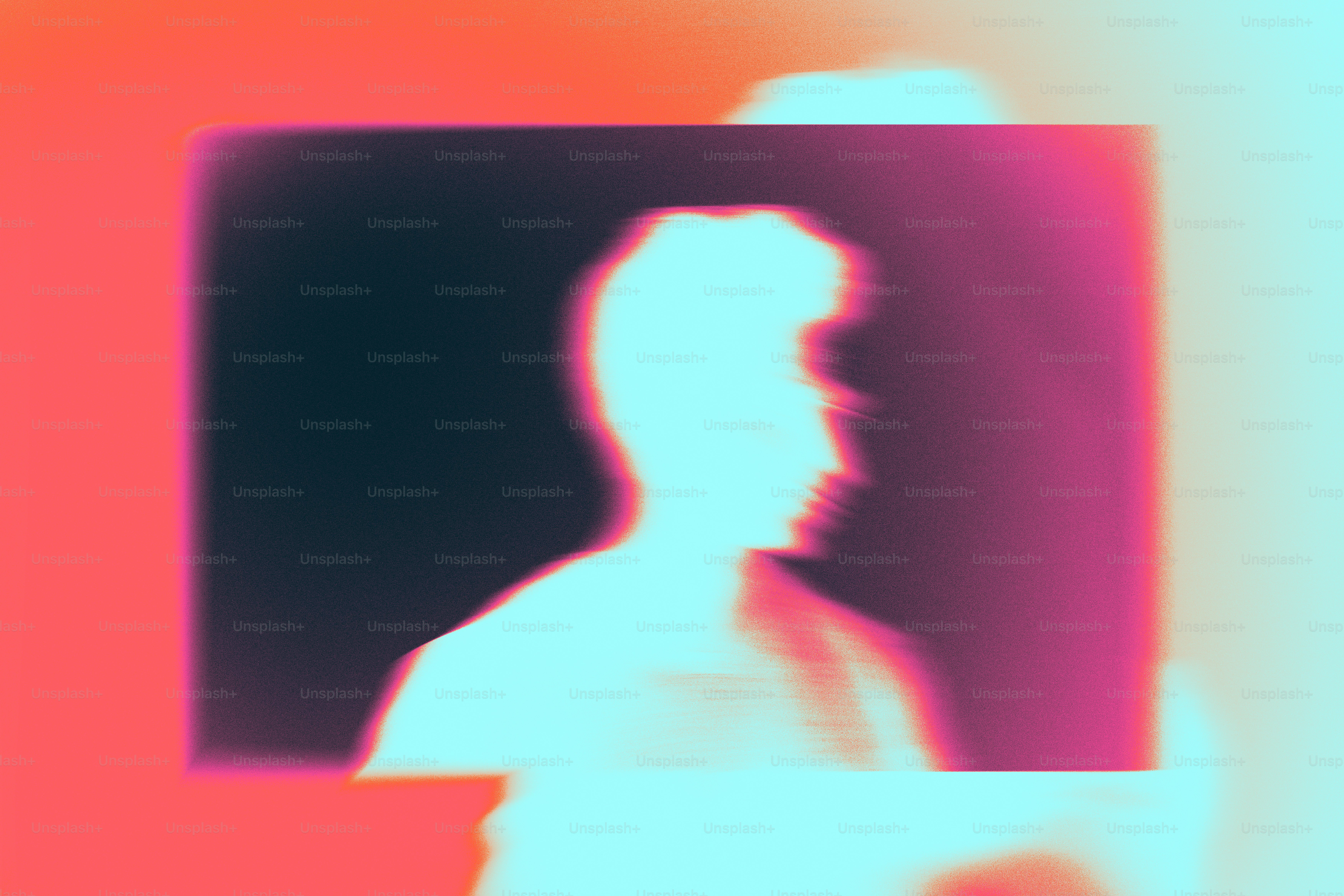 A blurry image of a man in a suit