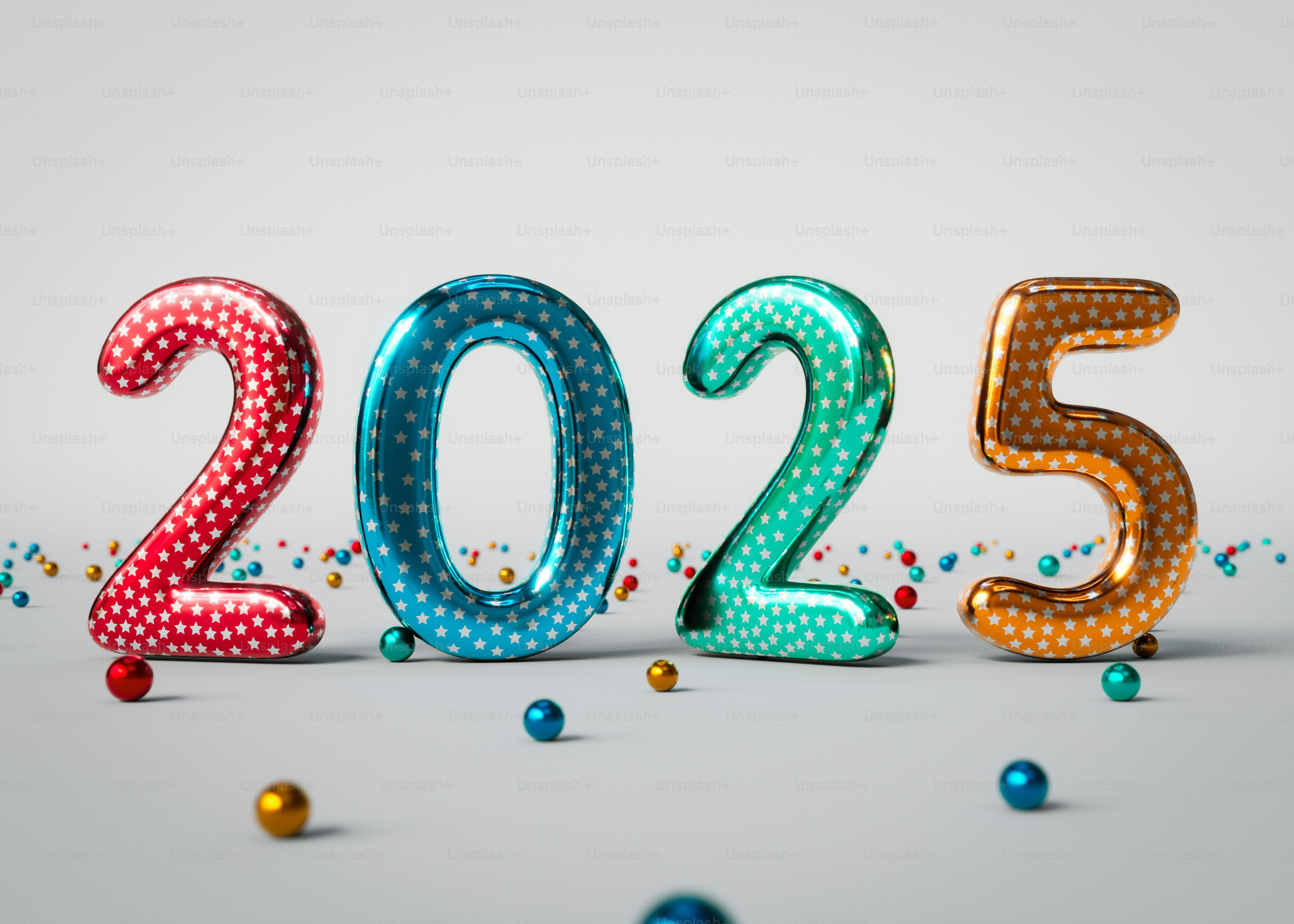 Eine Reihe von Luftballons und Konfetti in Form von Zahlen