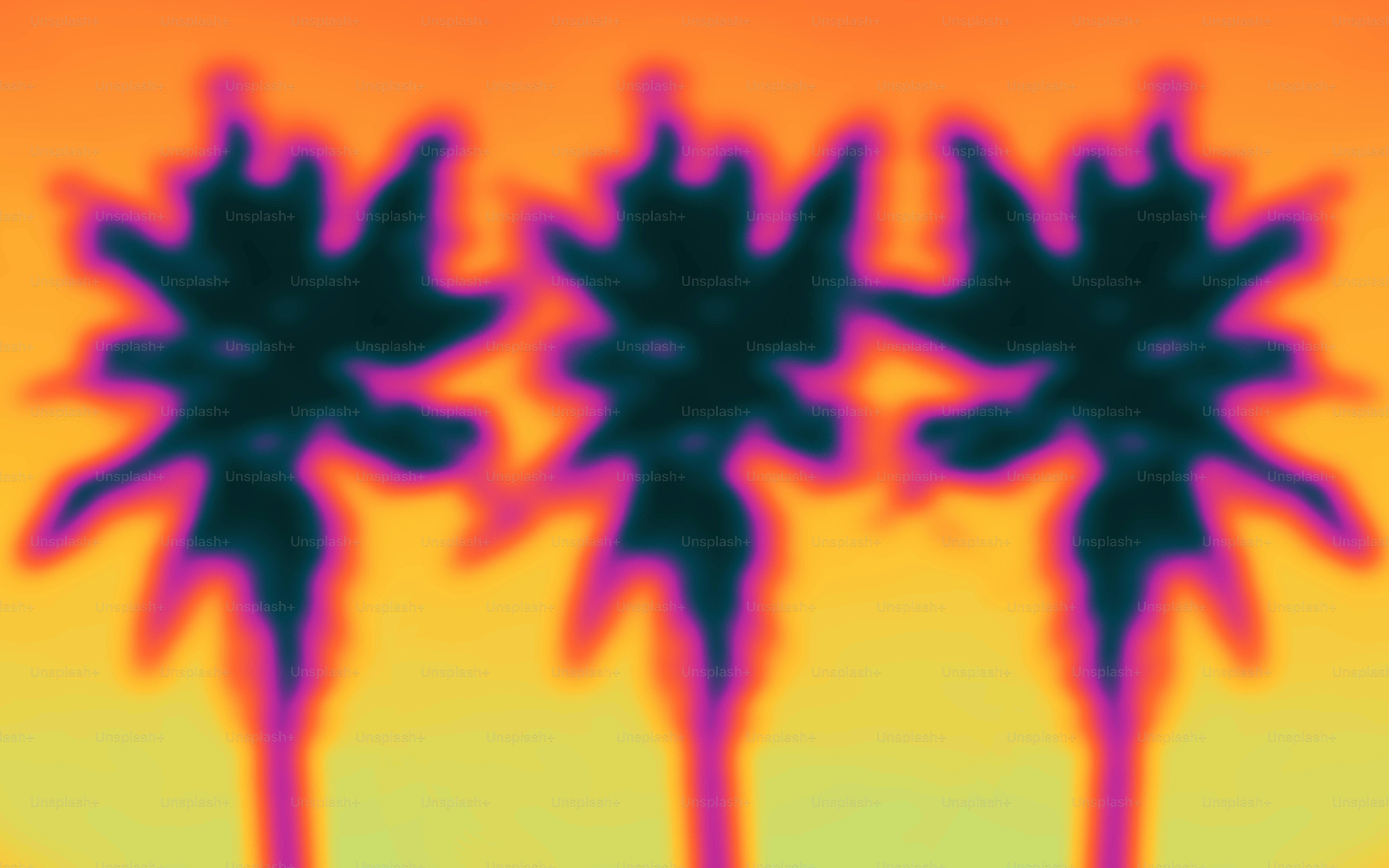 A picture of three palm trees with a sky background