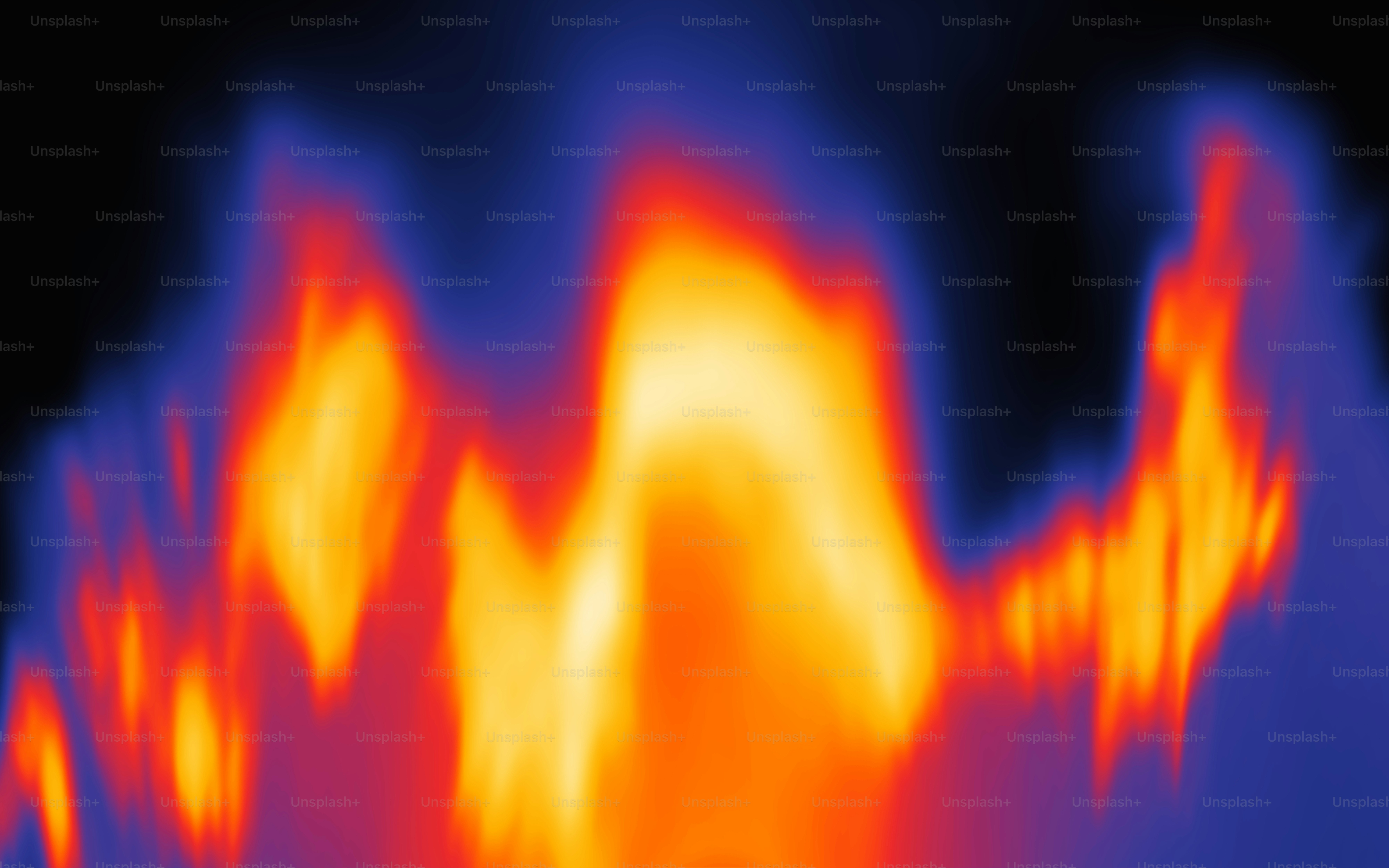 A blurry image of a blue and orange fire