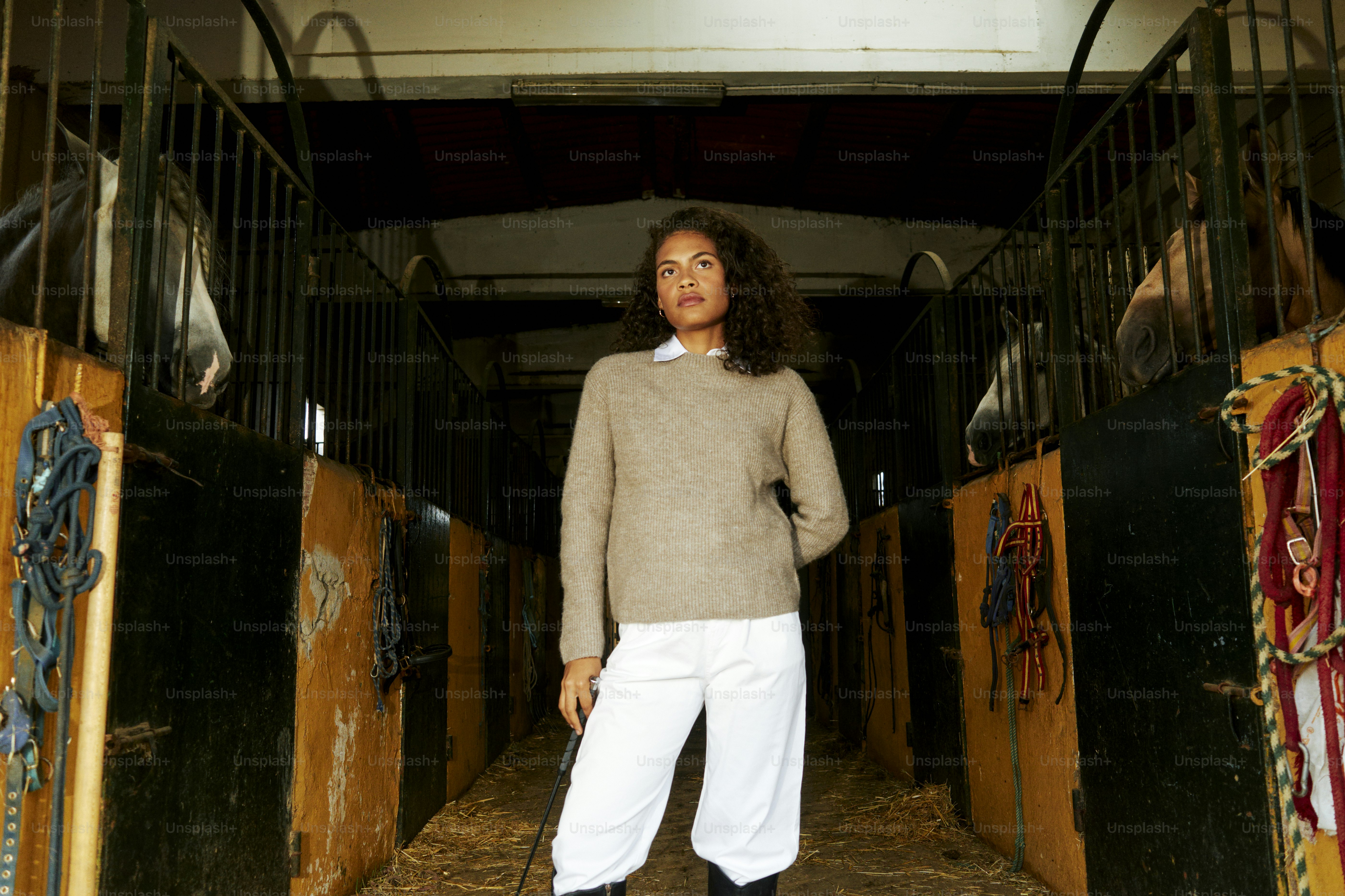 A woman standing in a doorway of a building
