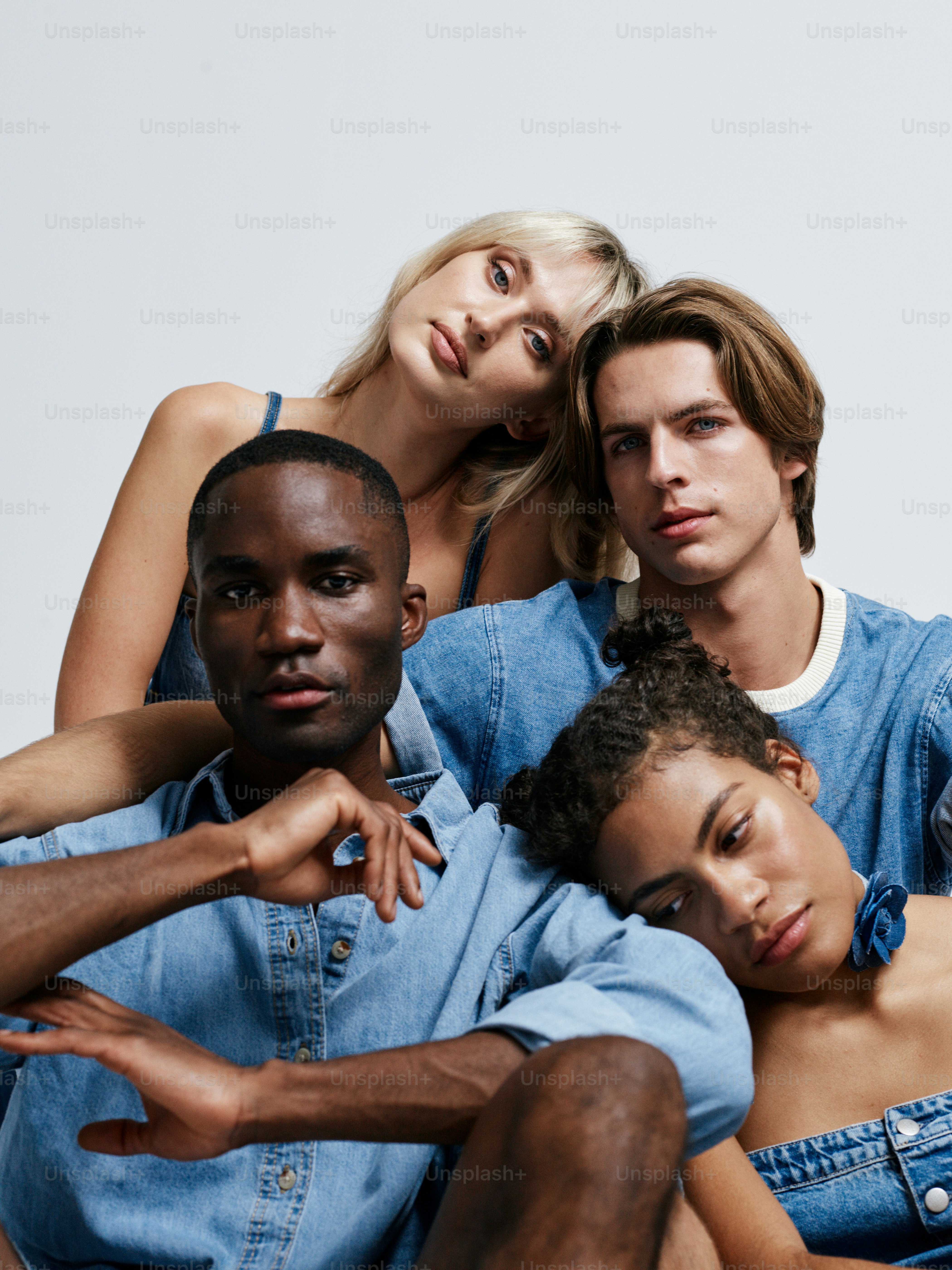 A group of young people sitting next to each other