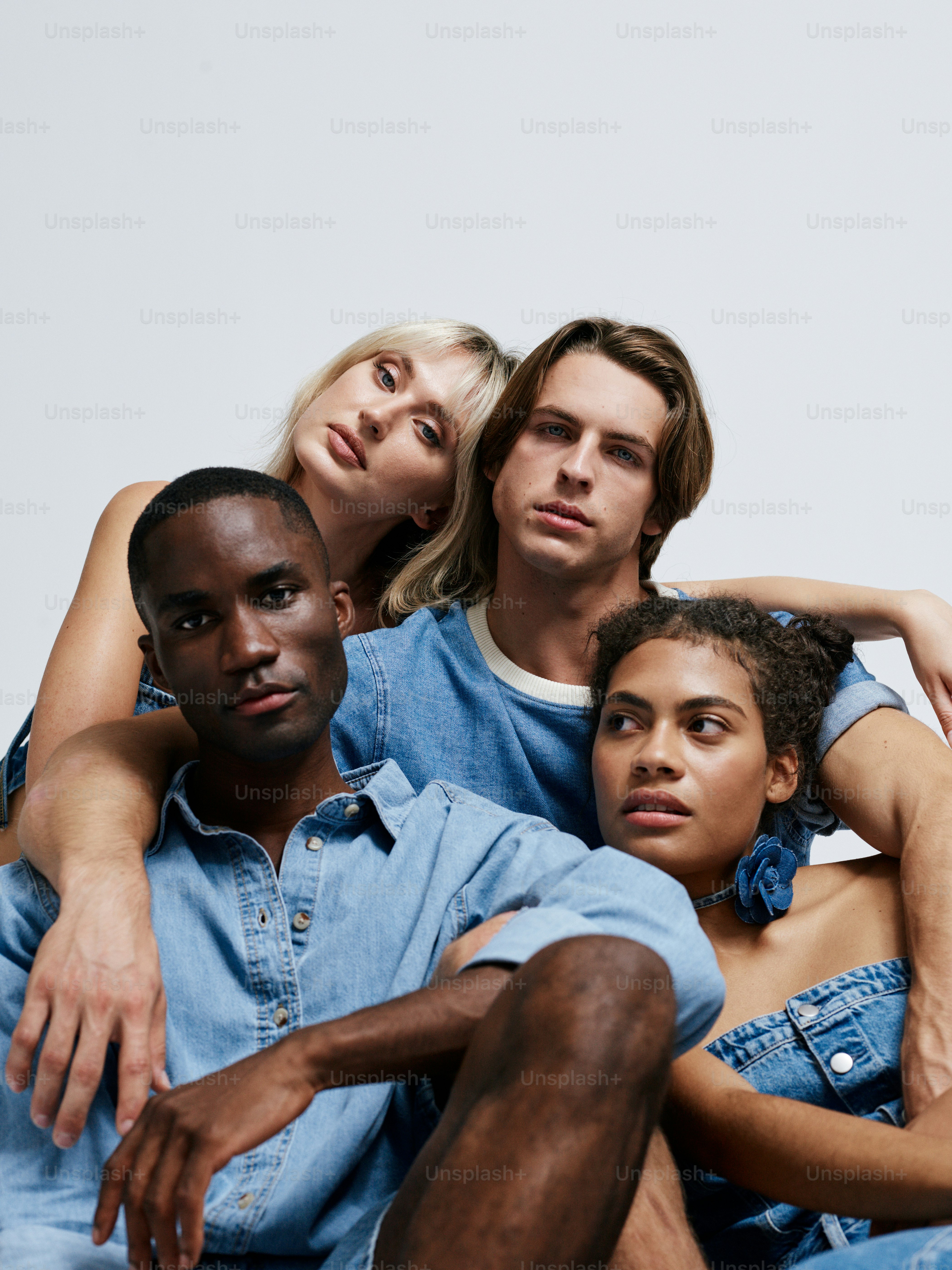 A group of people sitting next to each other