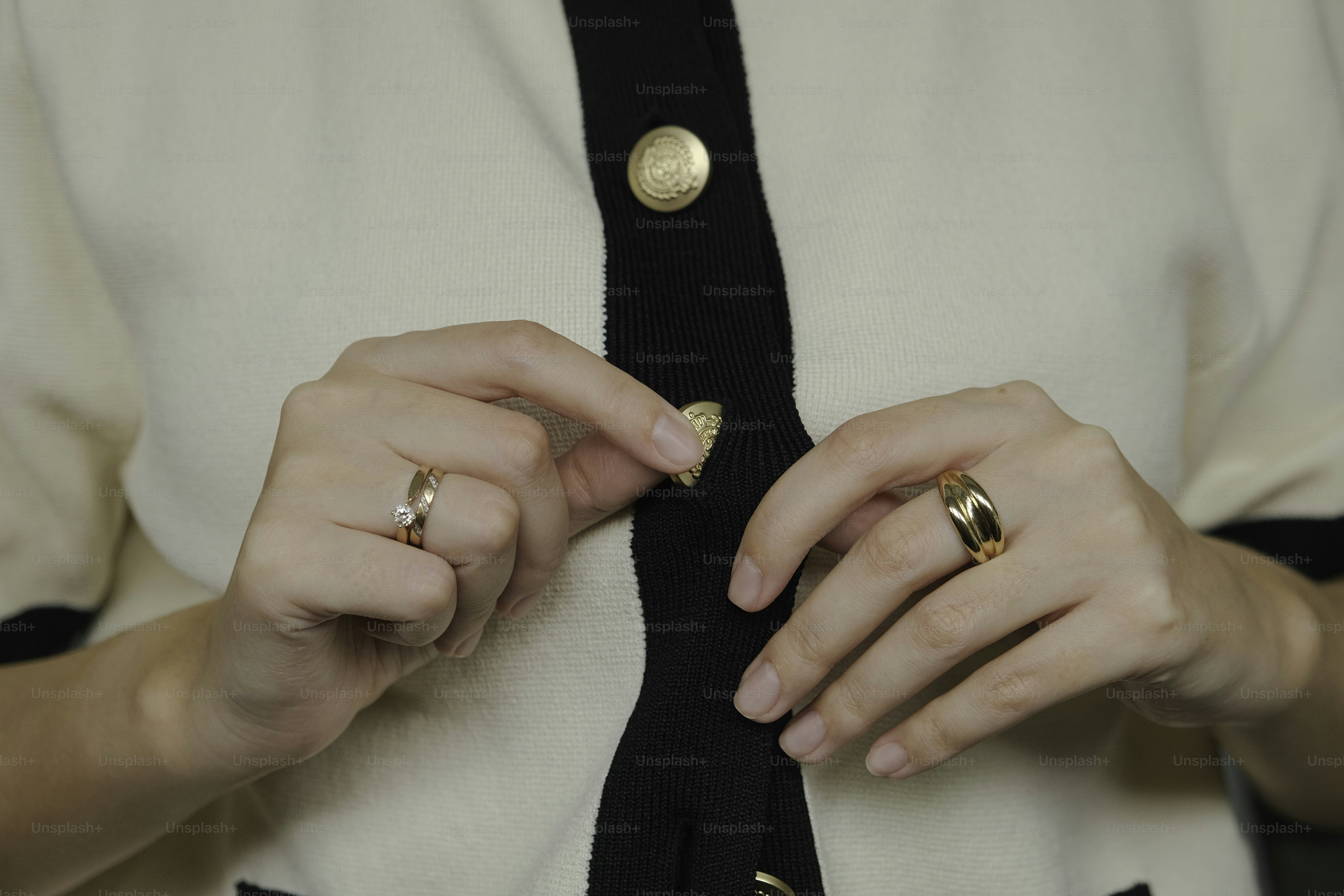 A woman in a white shirt and black tie