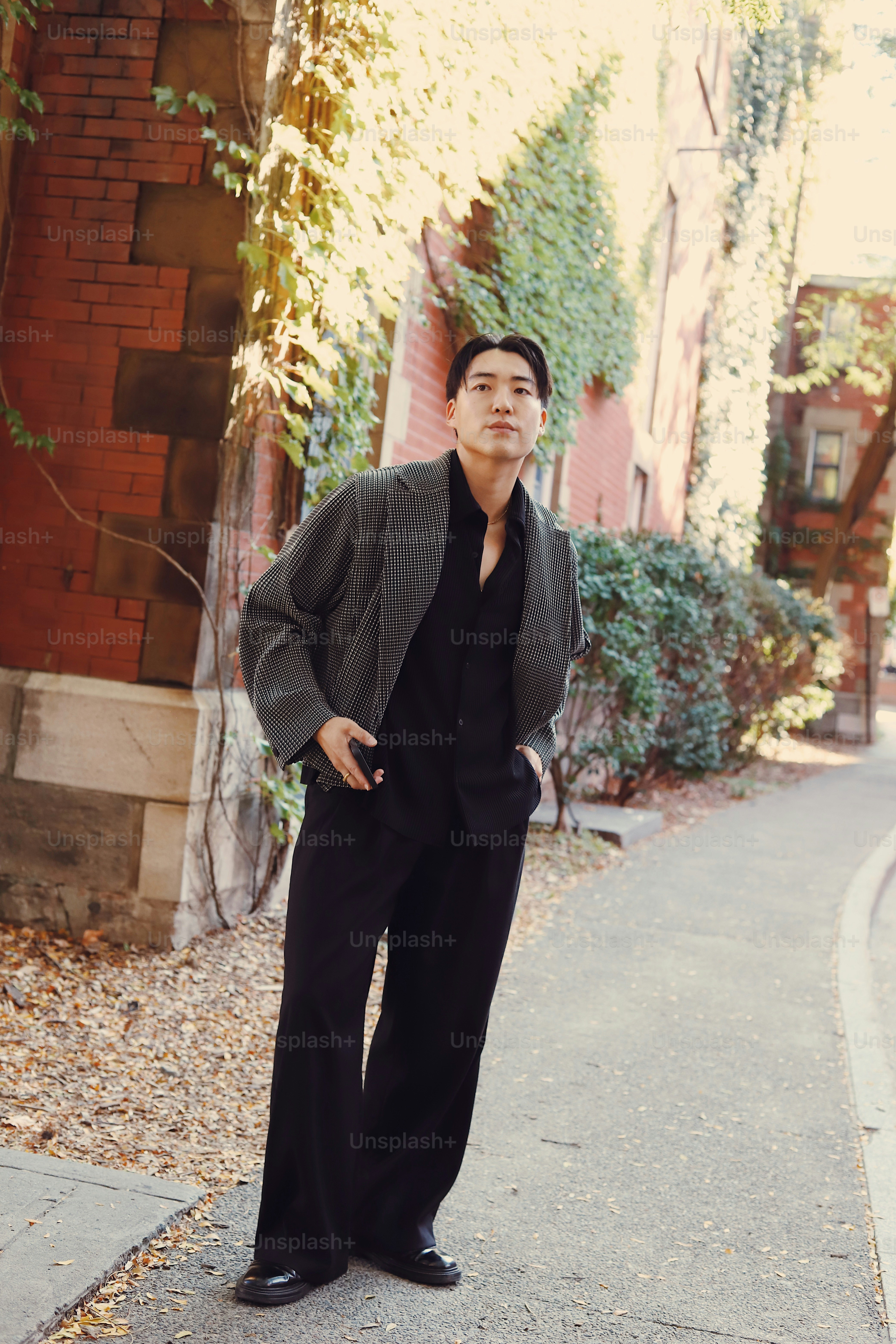 A man standing on the side of a road