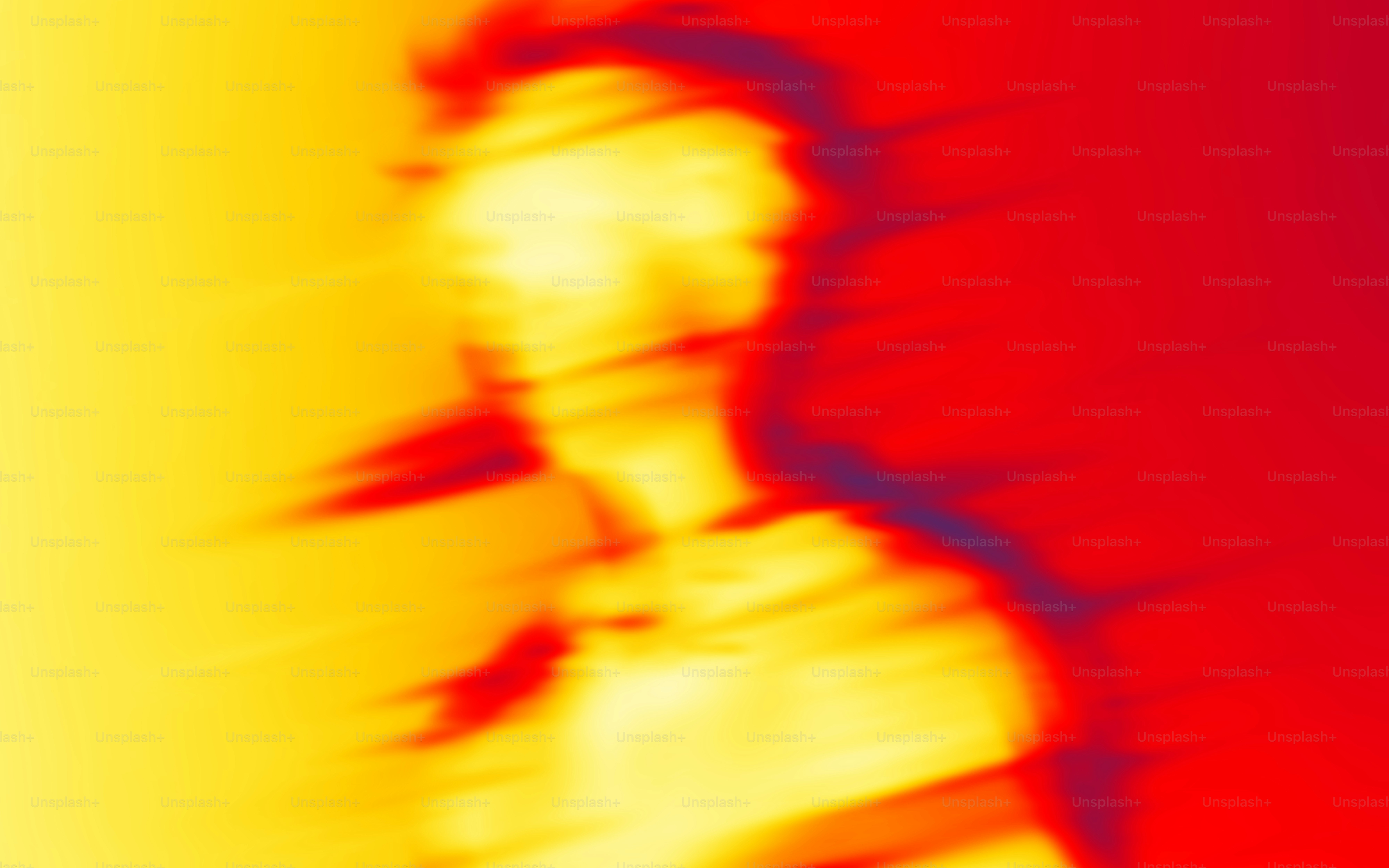 A blurry image of a man in a suit and tie