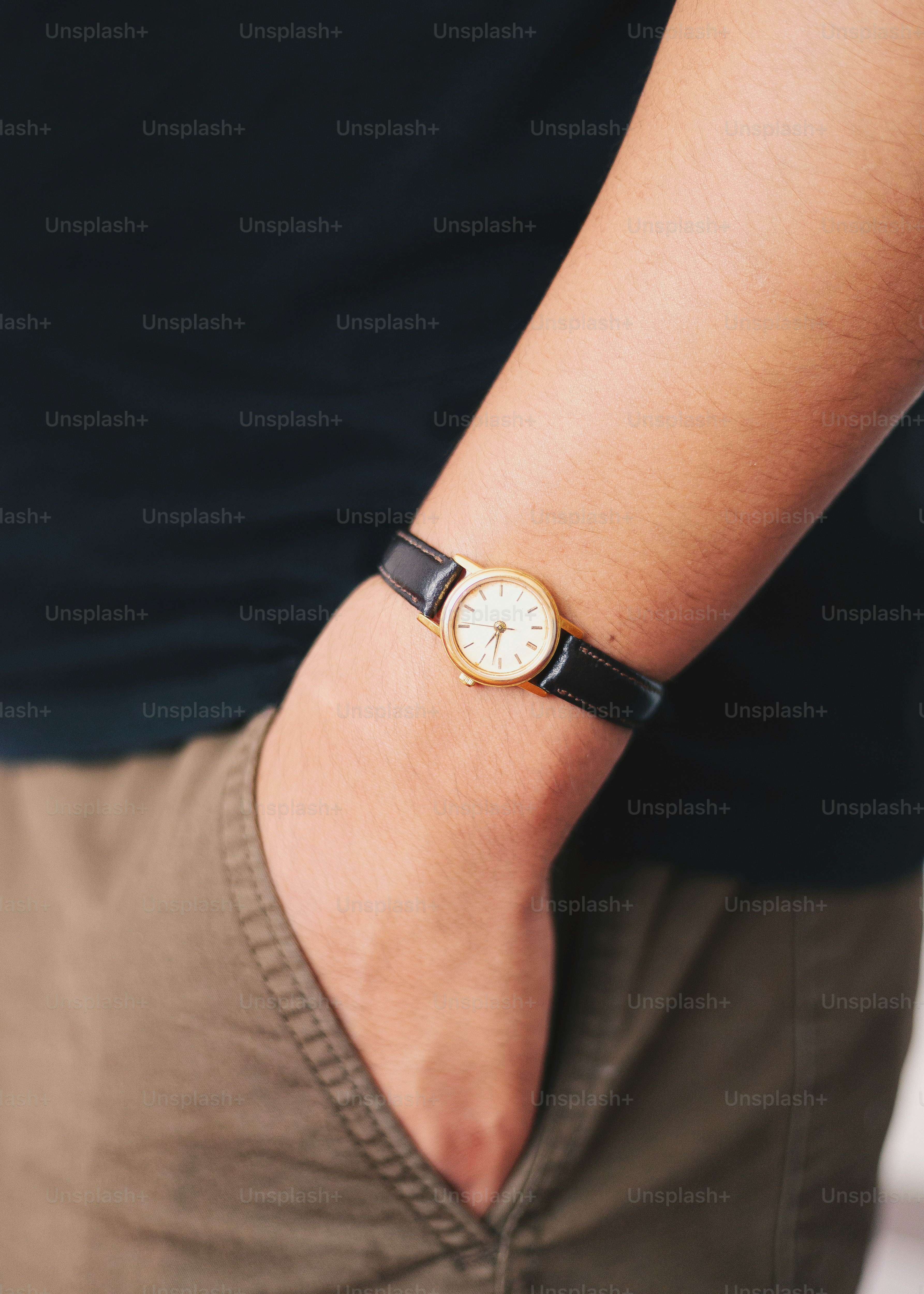 A close up of a person wearing a watch