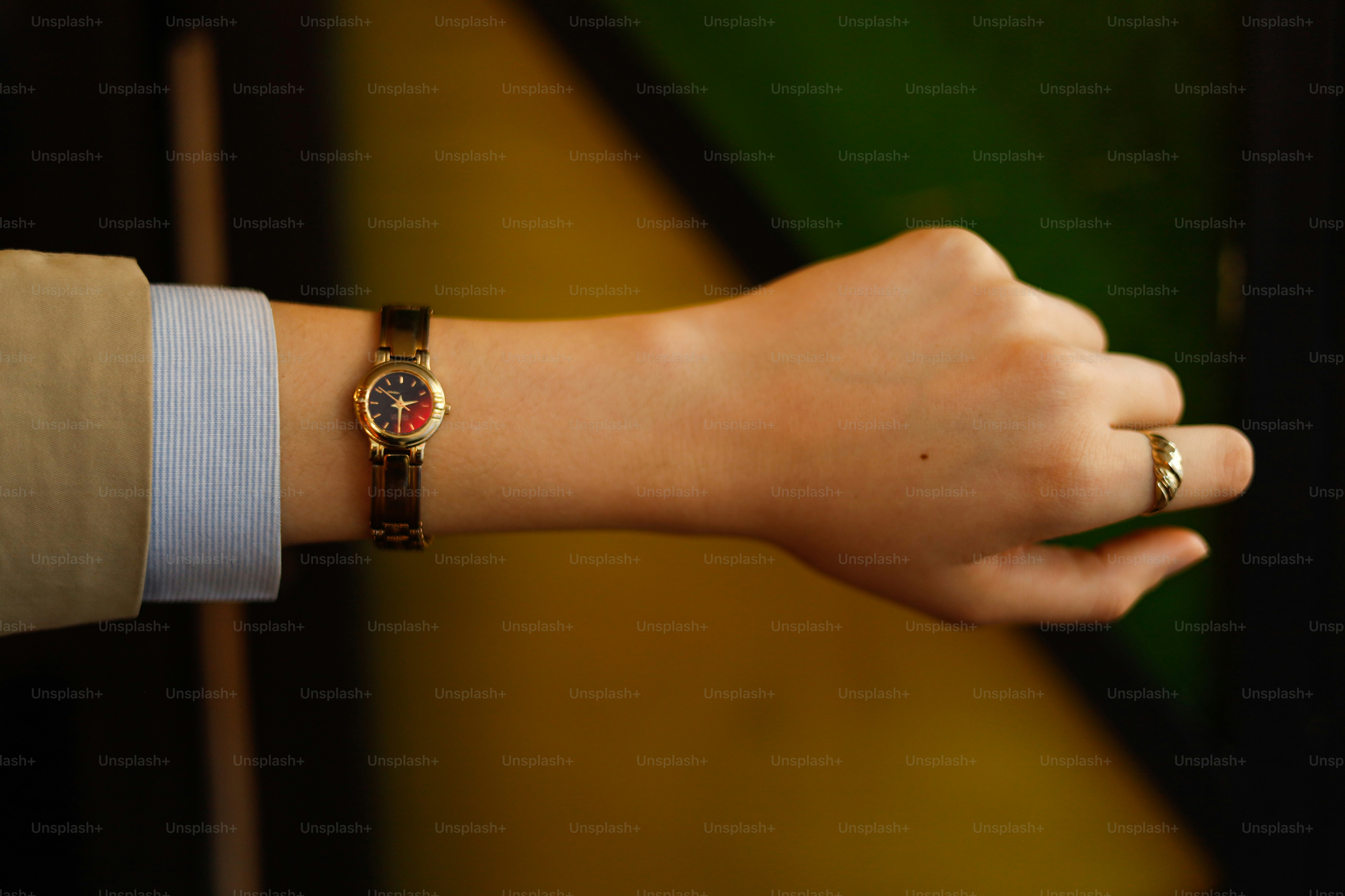 A person wearing a watch on their wrist