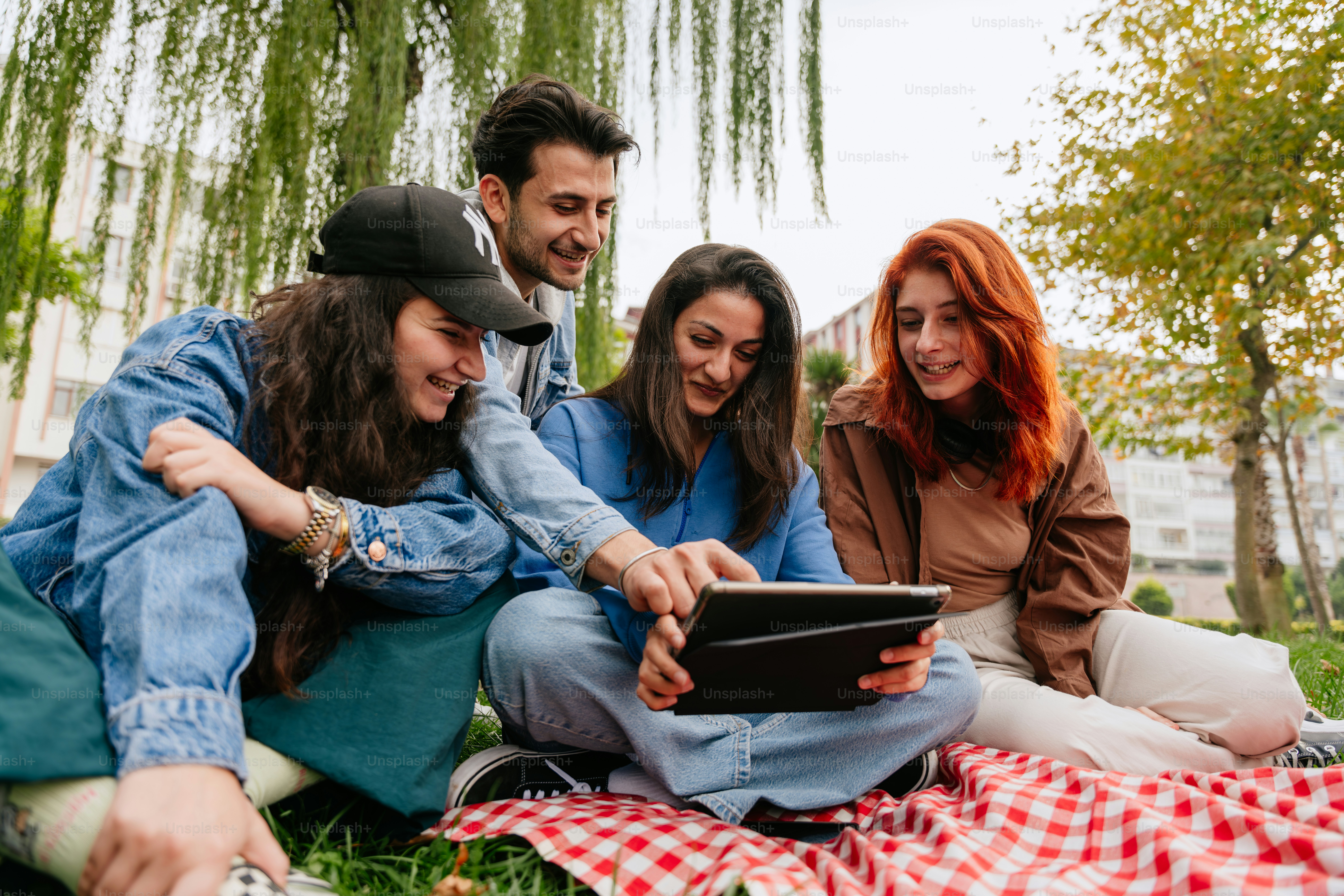 A group of young people posing for a picture photo – Blue Image on Unsplash