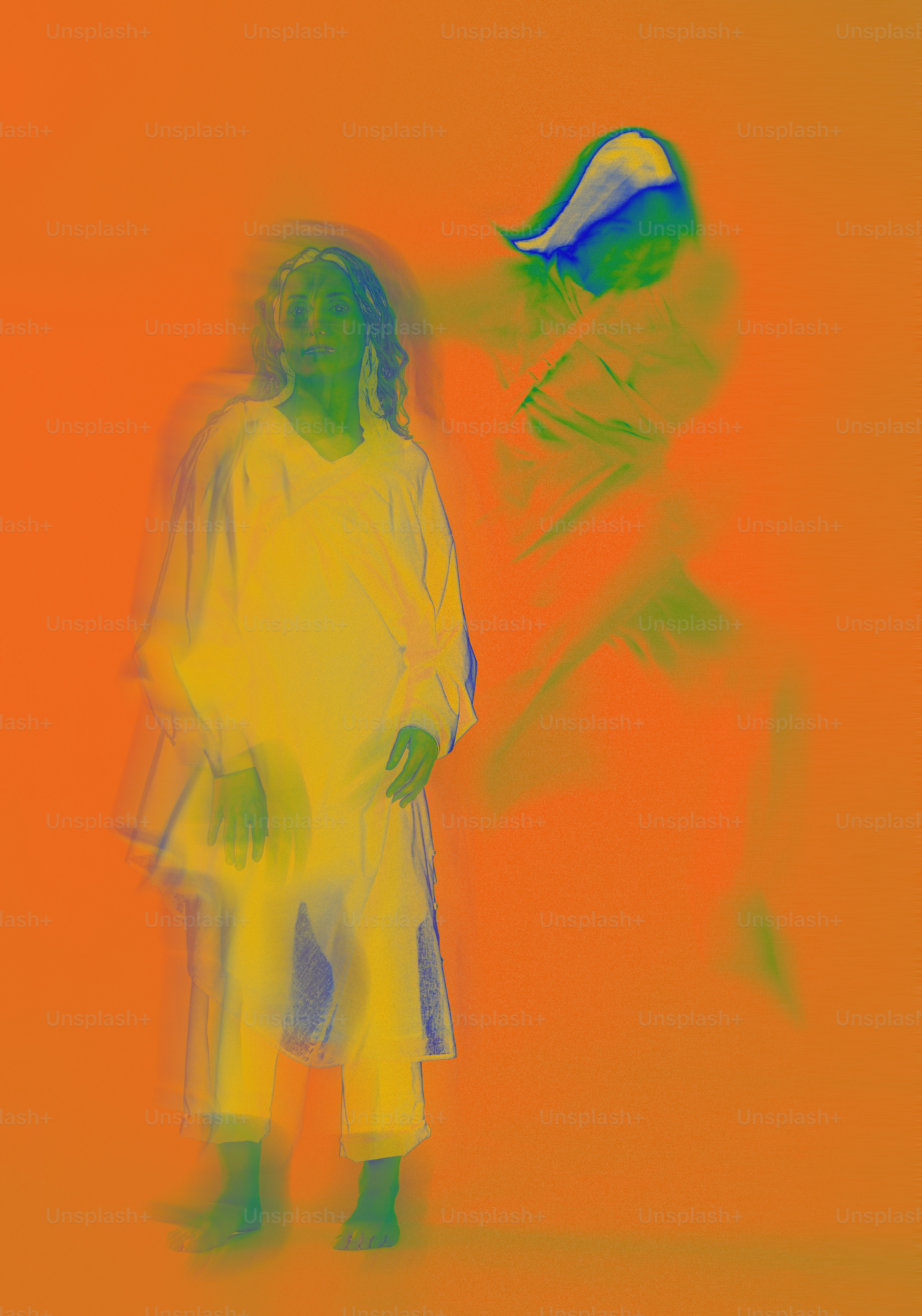 A blurry image of a woman standing next to a man