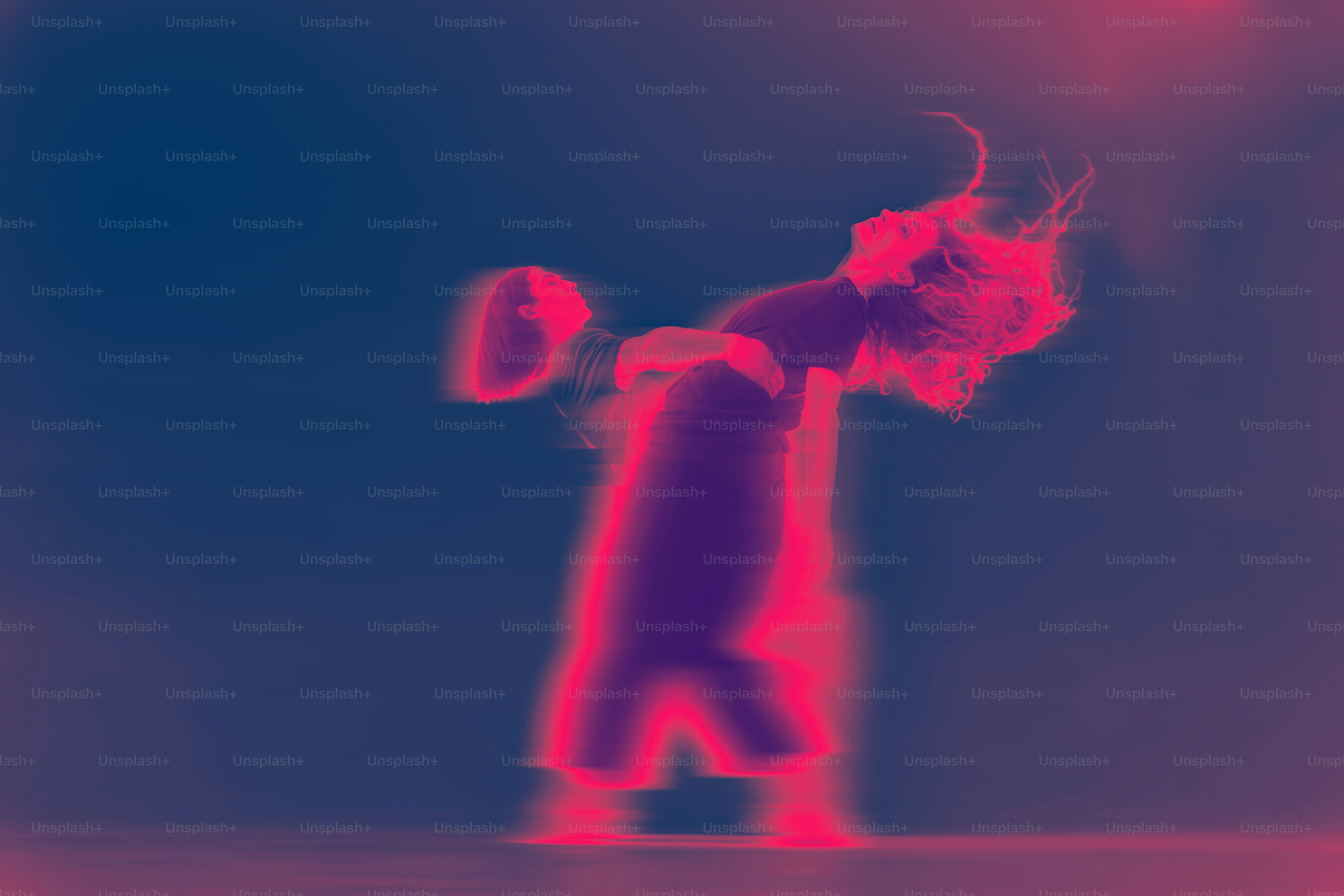 A blurry image of a person holding a tennis racquet