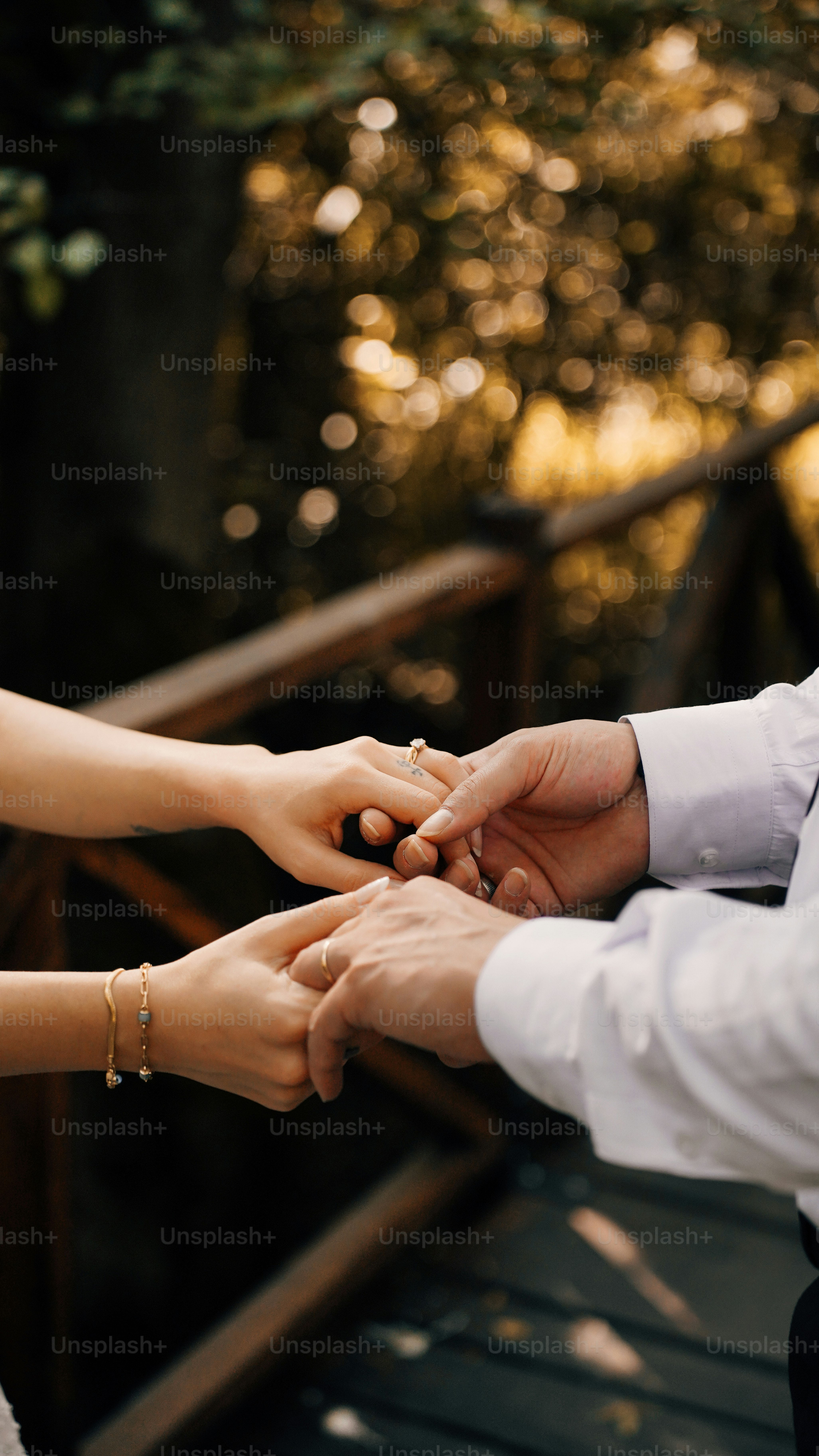 A man and a woman holding hands together