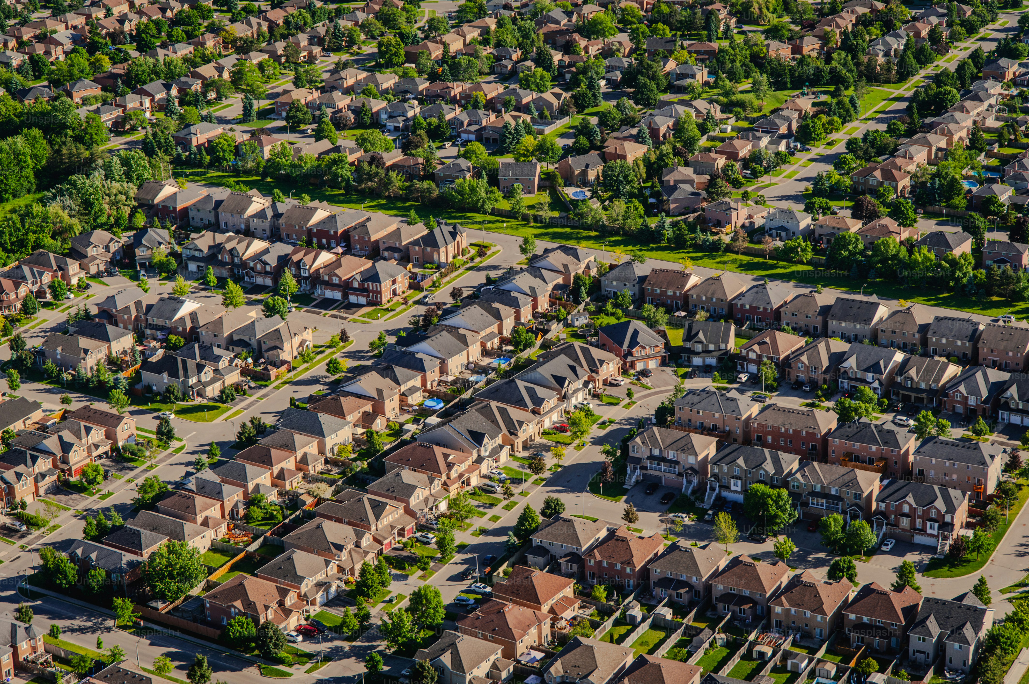 An aerial view of a neighborhood with many houses