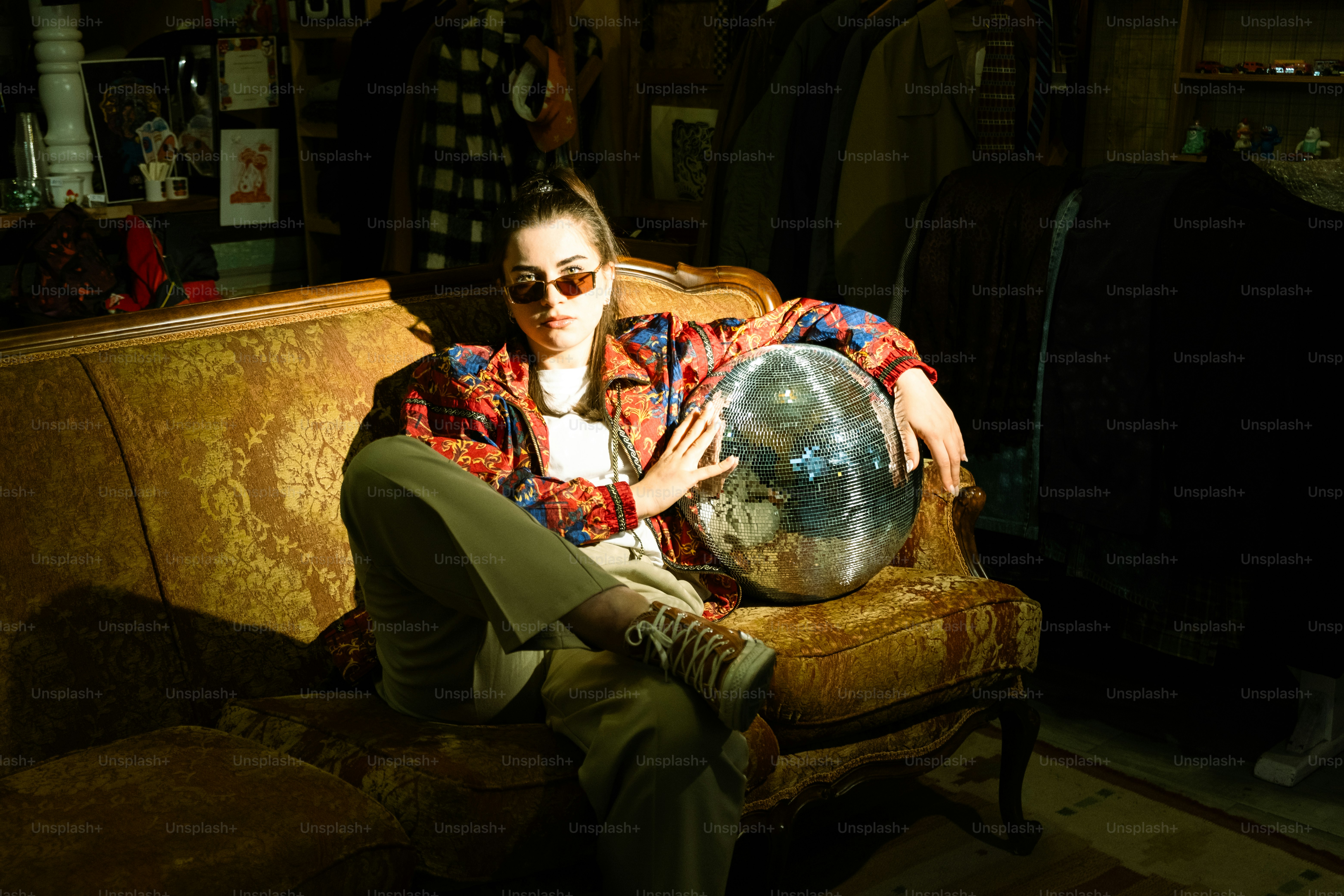 A woman sitting on a couch in a room