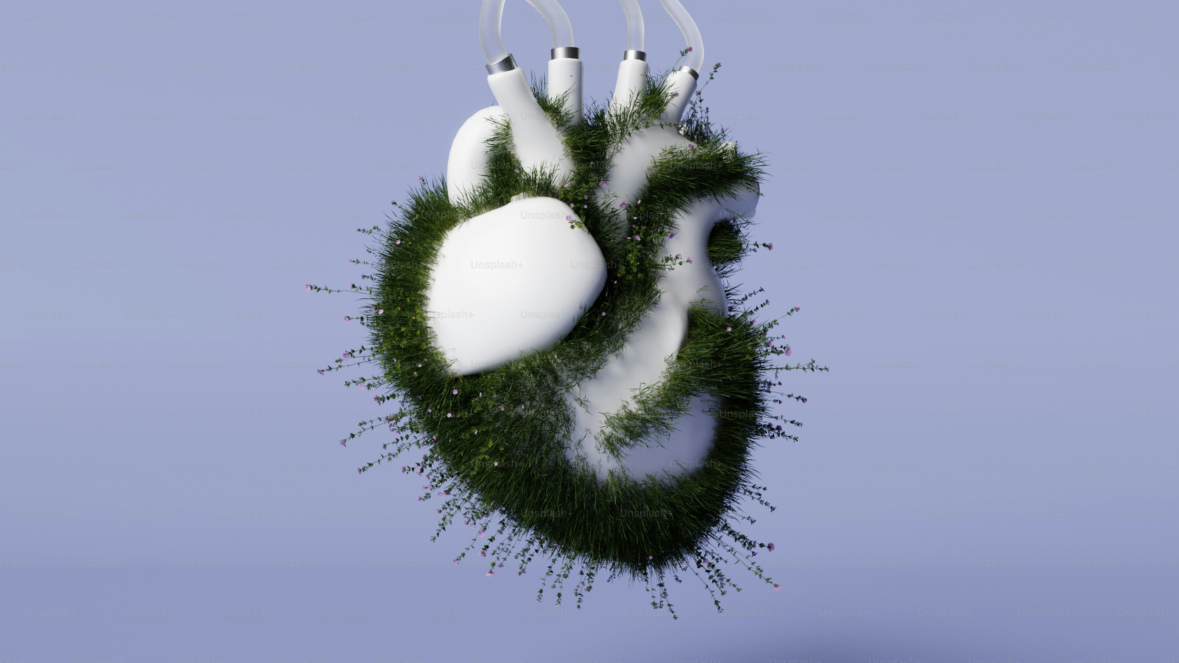 A heart shaped object hanging from a string