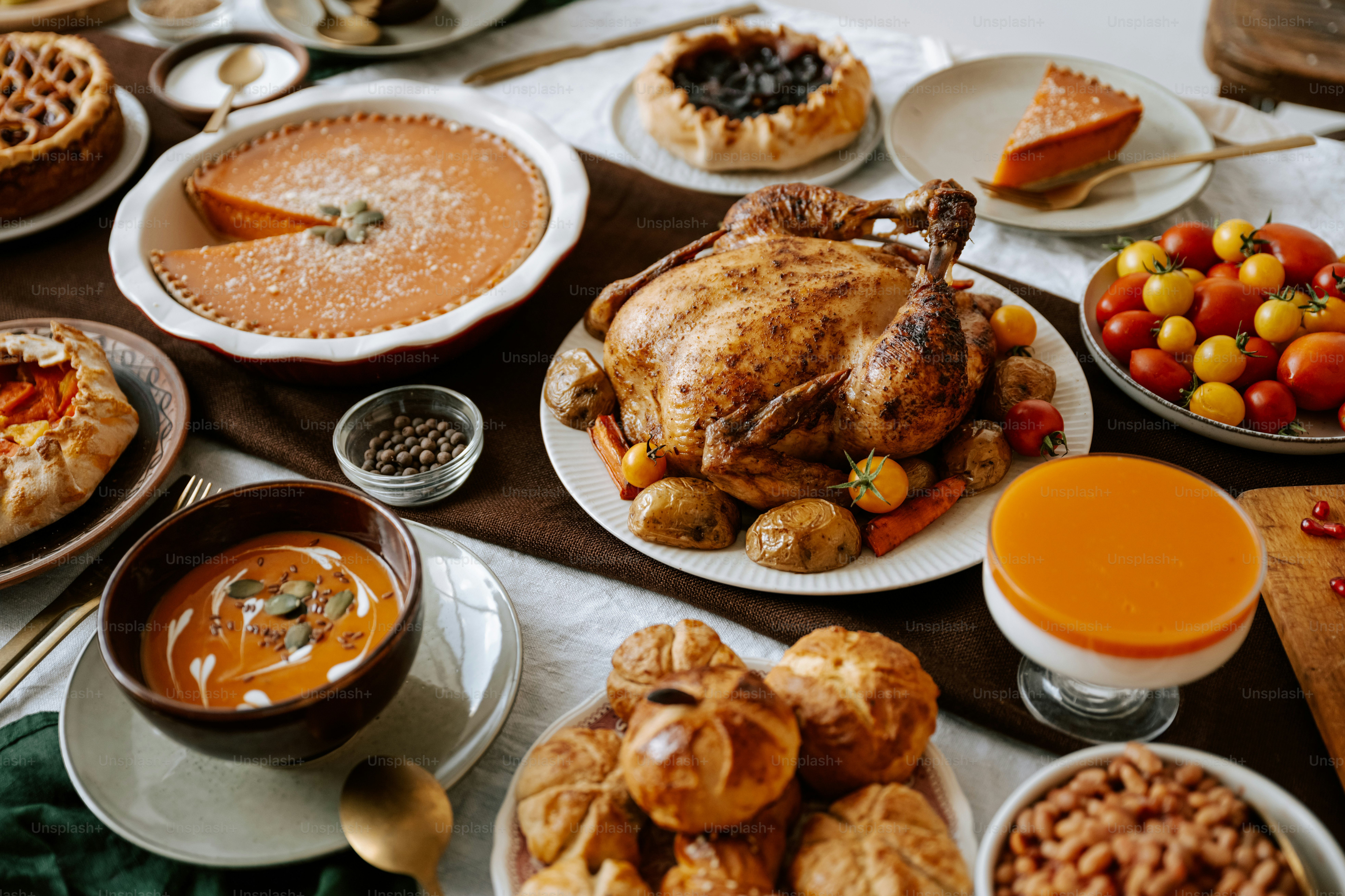 A table topped with lots of different types of food