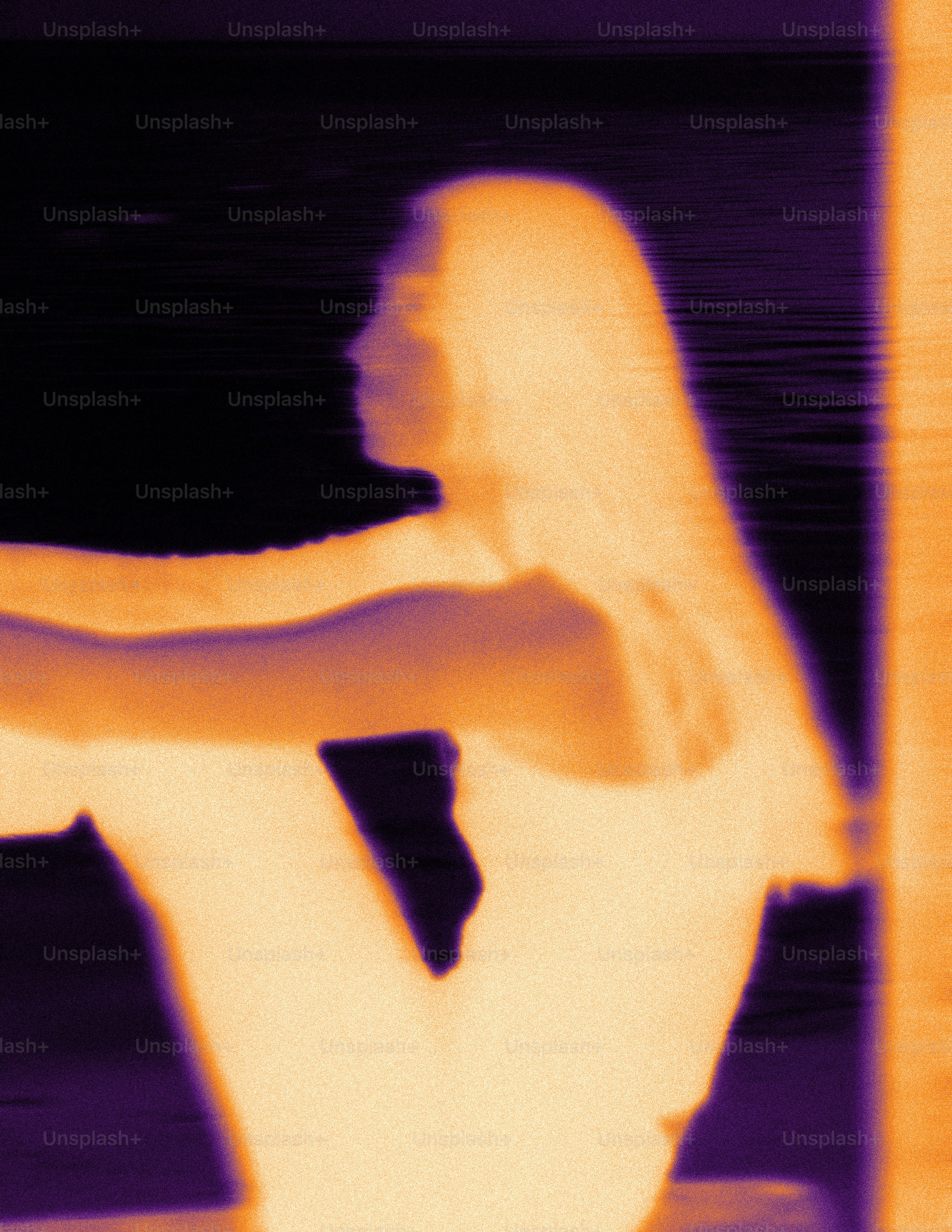 A woman in a white dress holding a tennis racquet