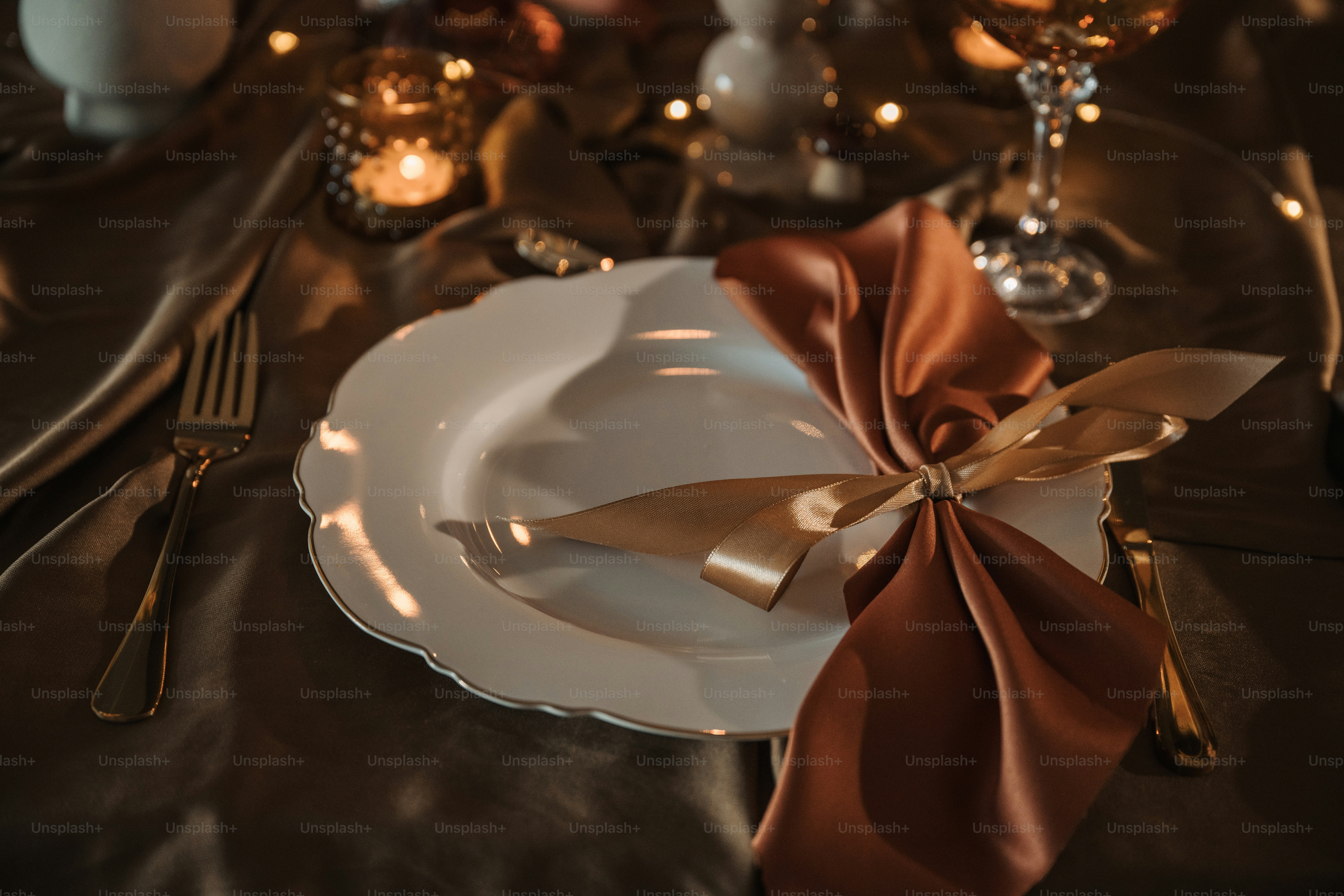 A white plate with a brown bow on it