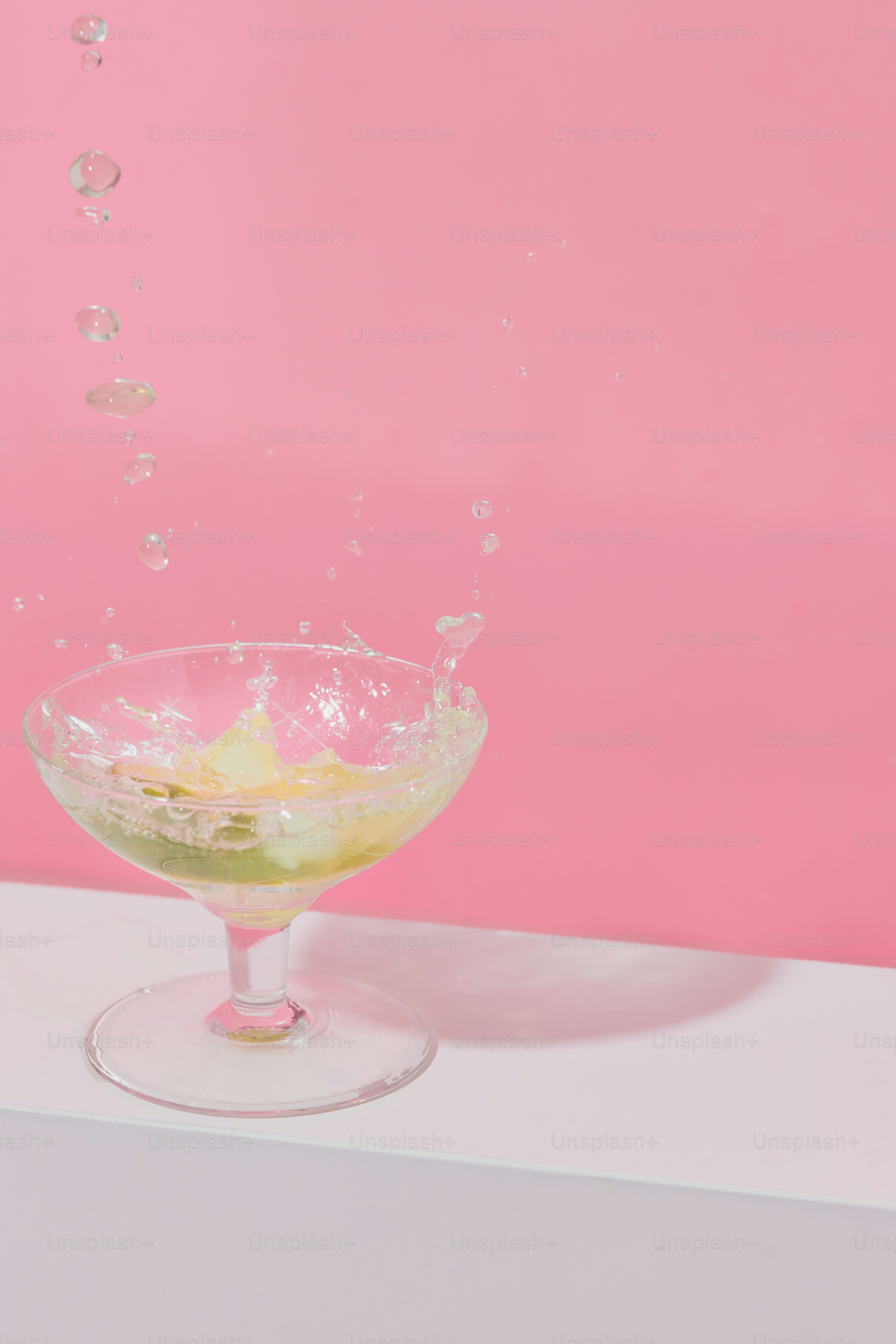 A glass filled with liquid on top of a table