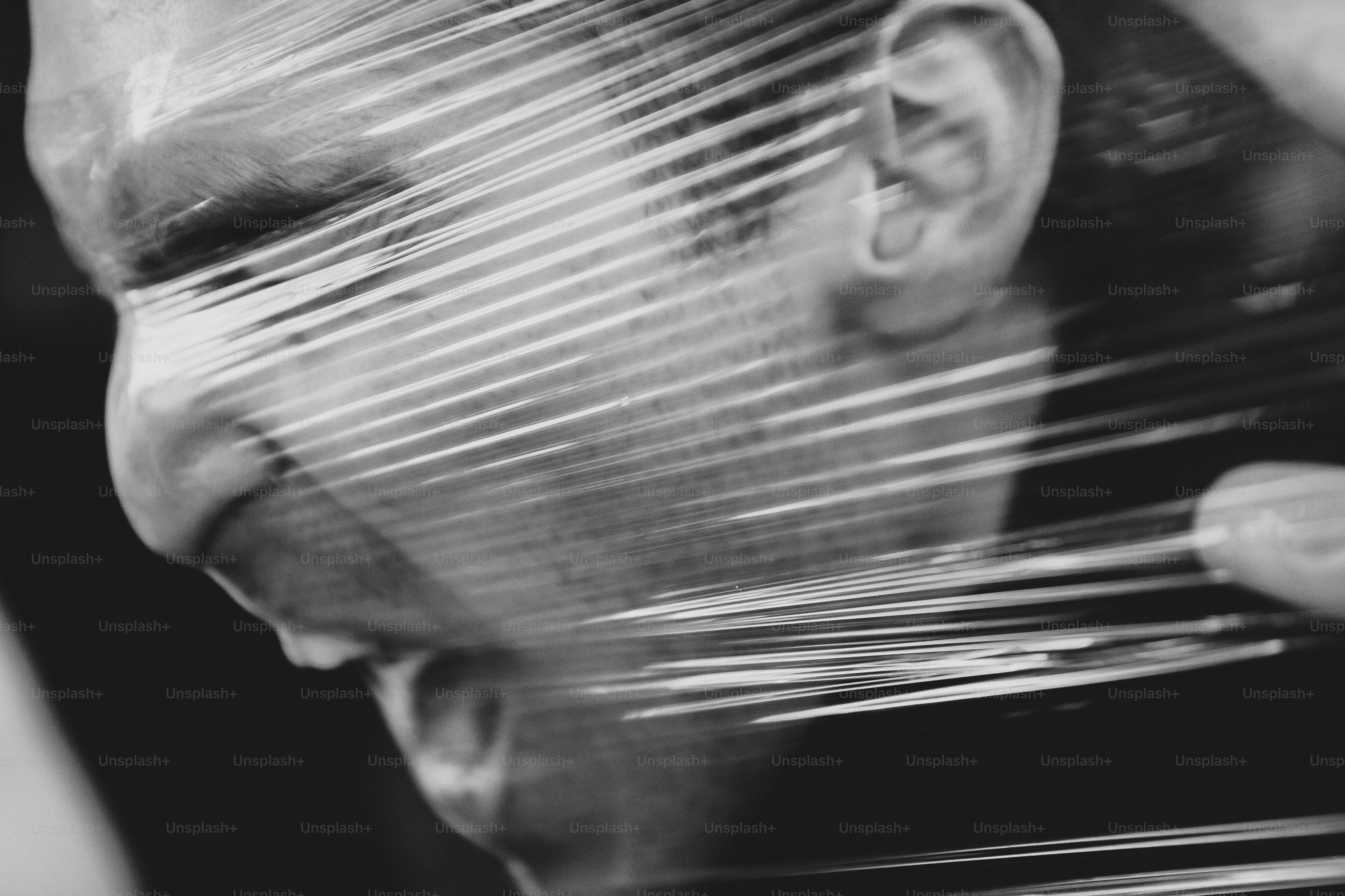 A black and white photo of a man's face