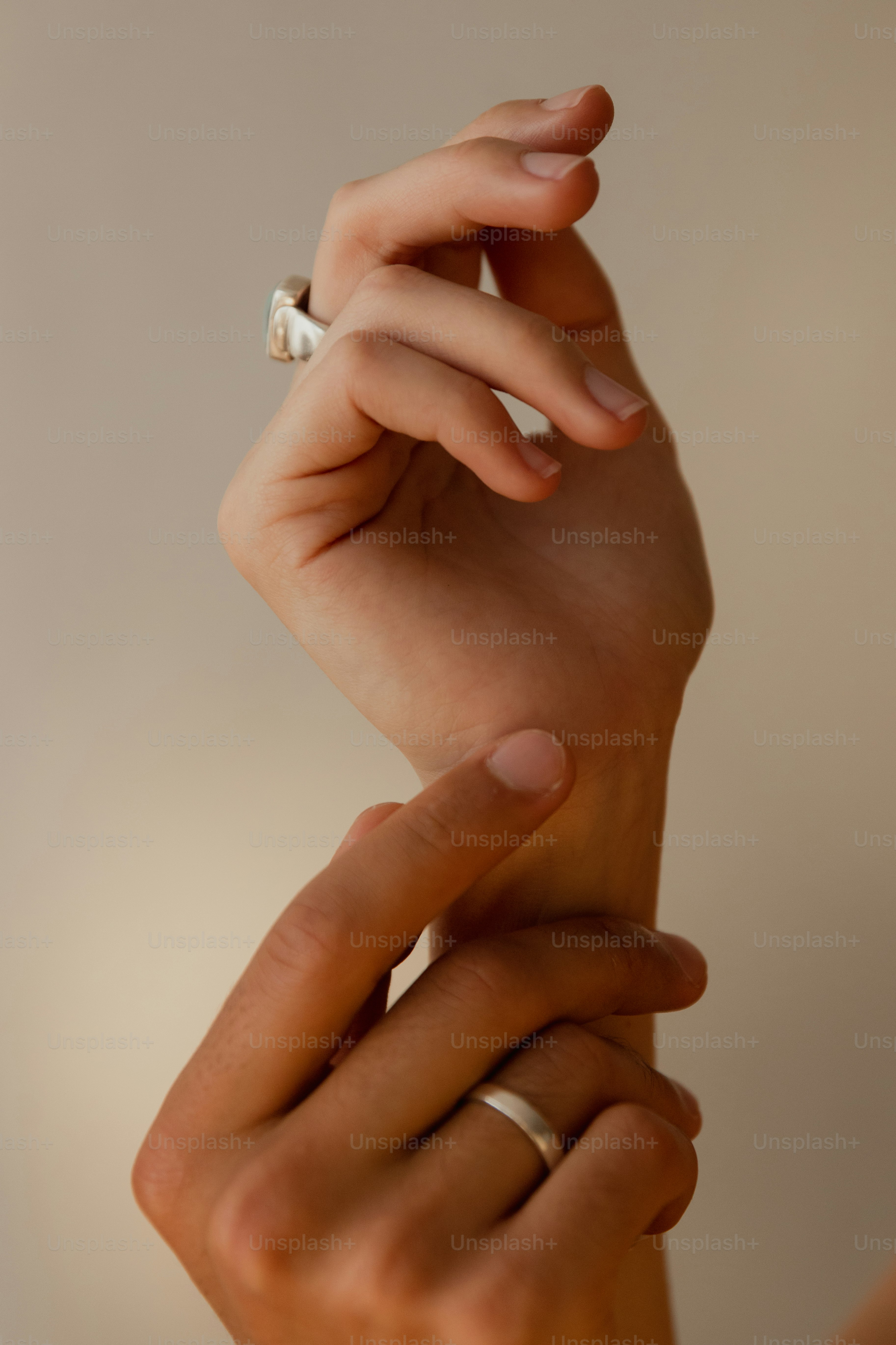 A woman's hand with a ring on it