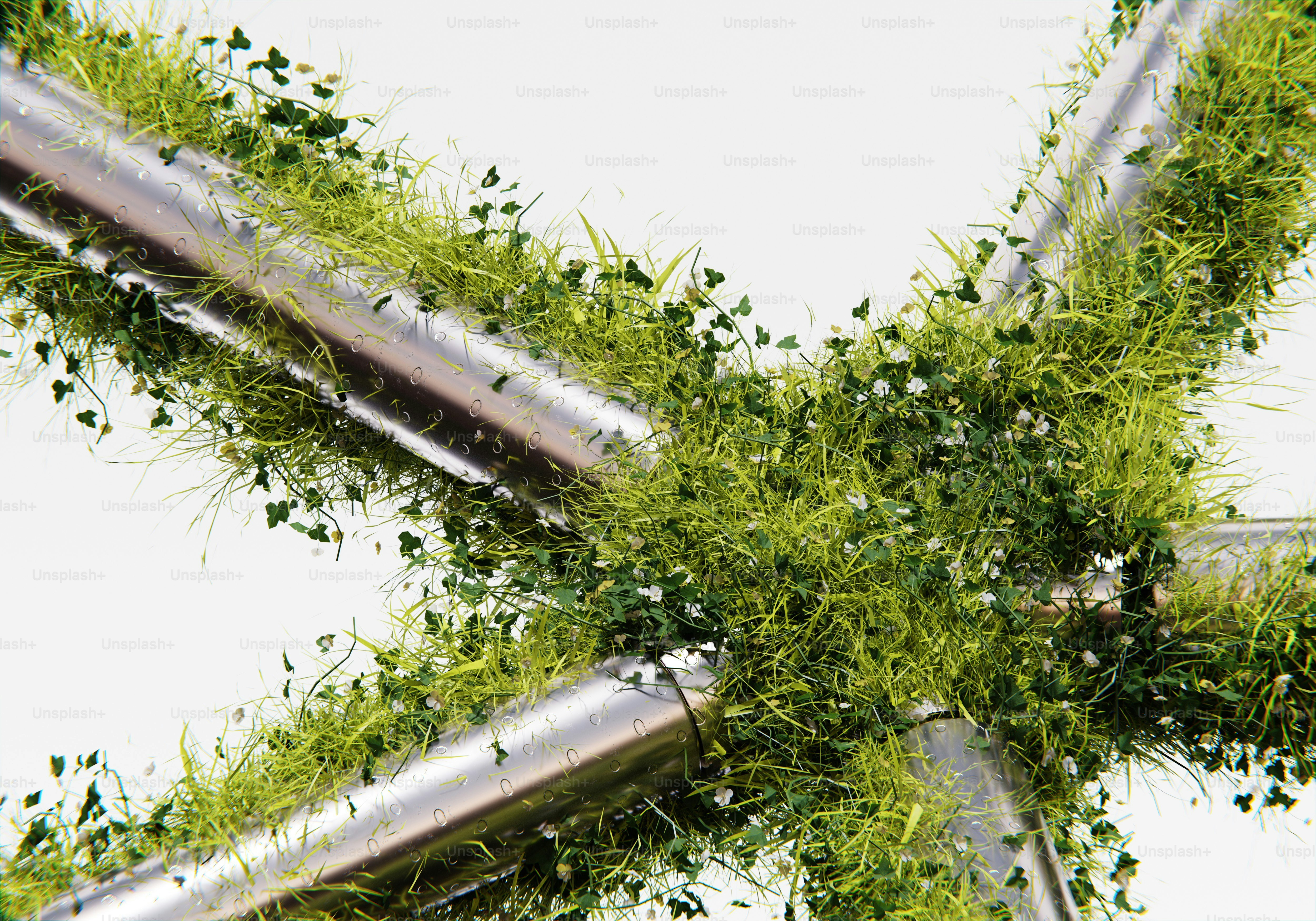 Uma estrela feita de tubos de metal com grama crescendo dela