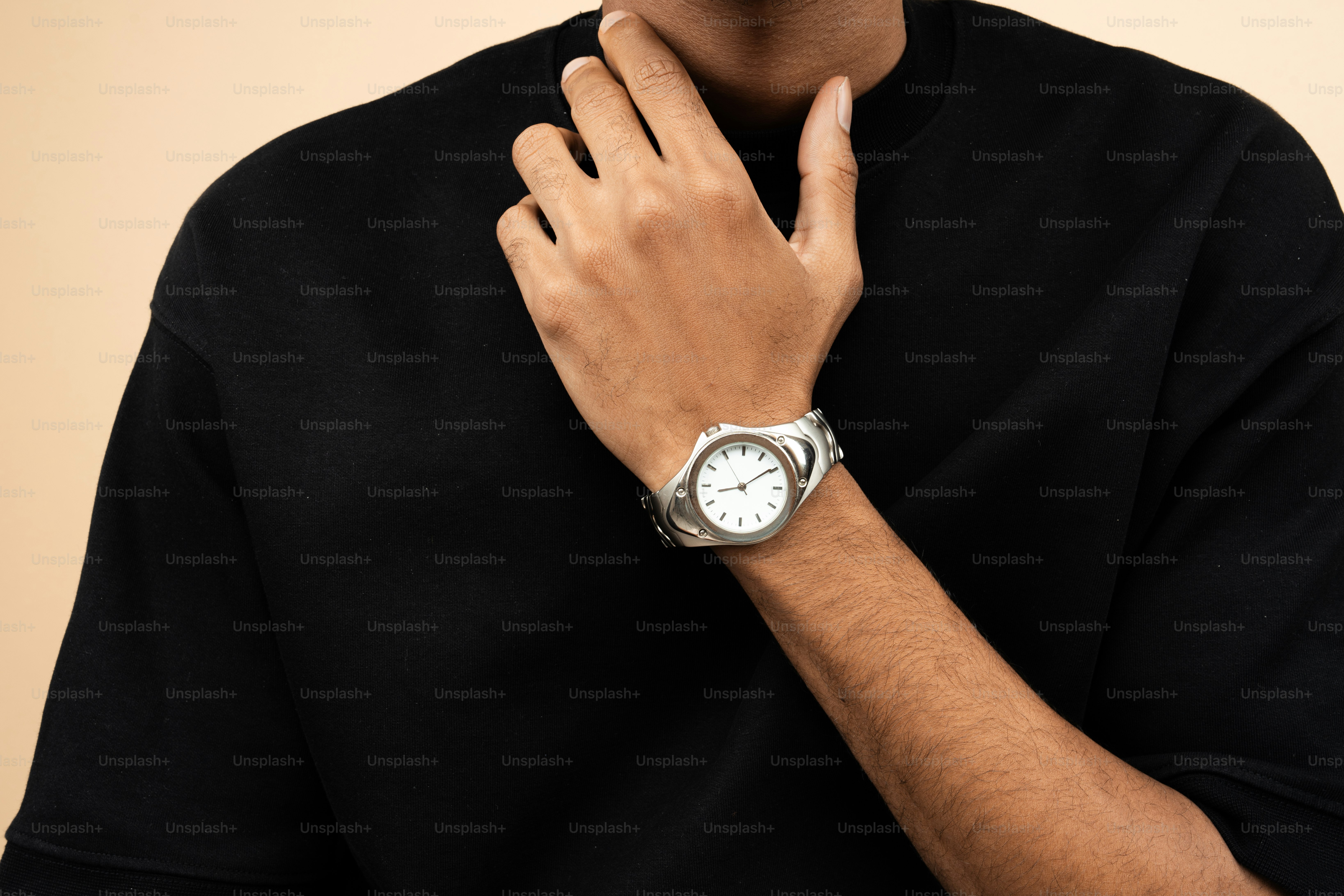 A man with a watch on his wrist