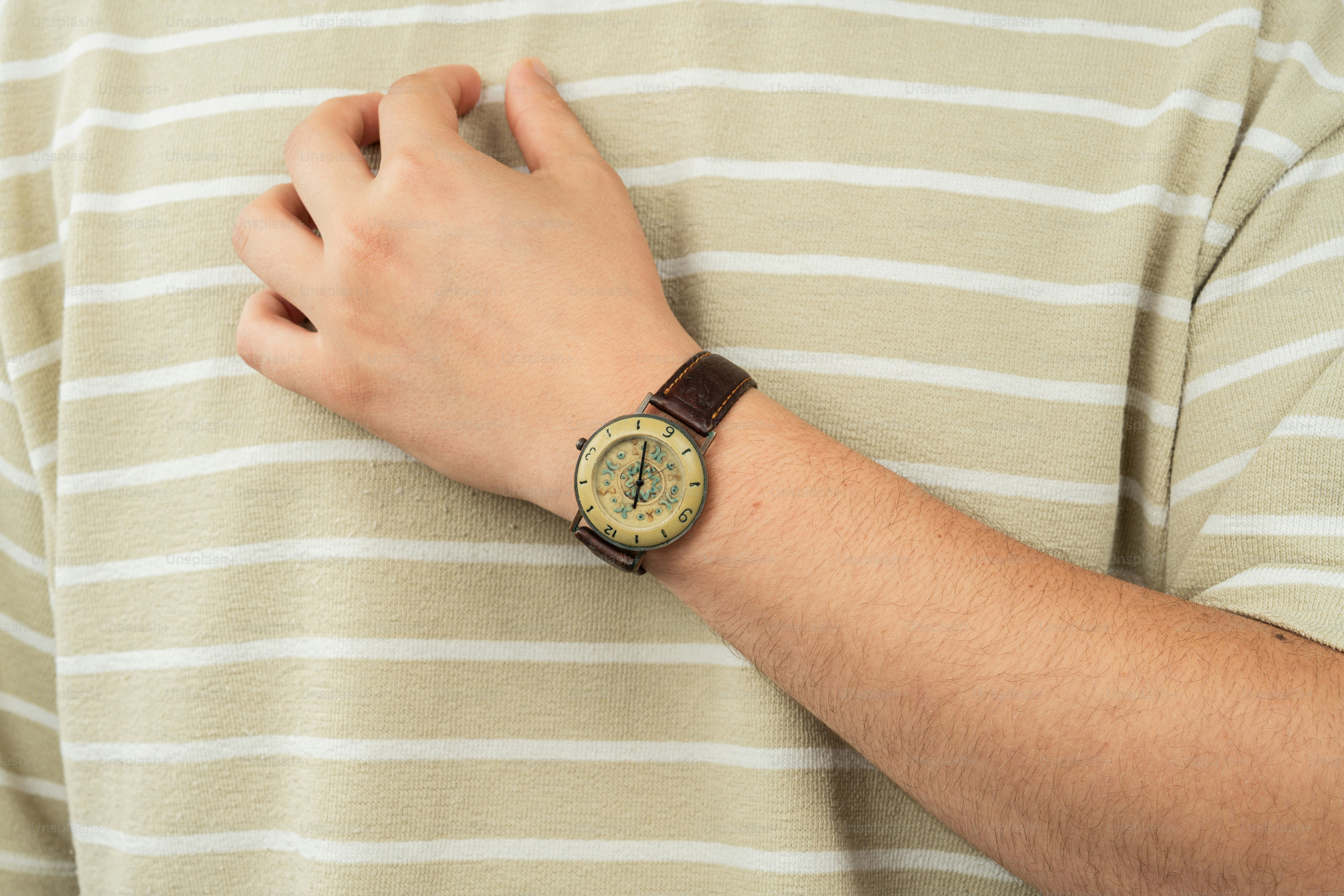 A man with a watch on his wrist
