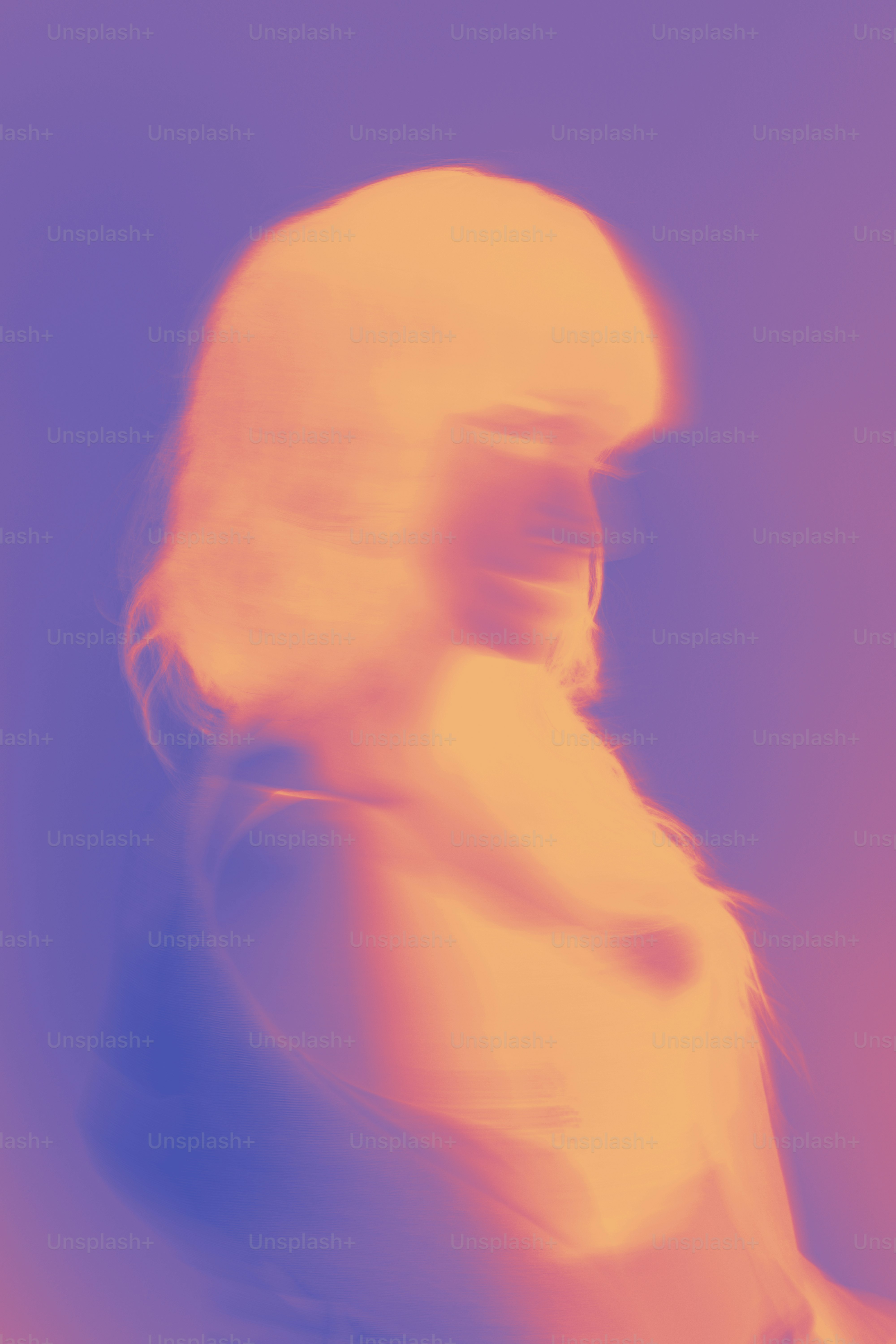 A blurry image of a man in a white shirt
