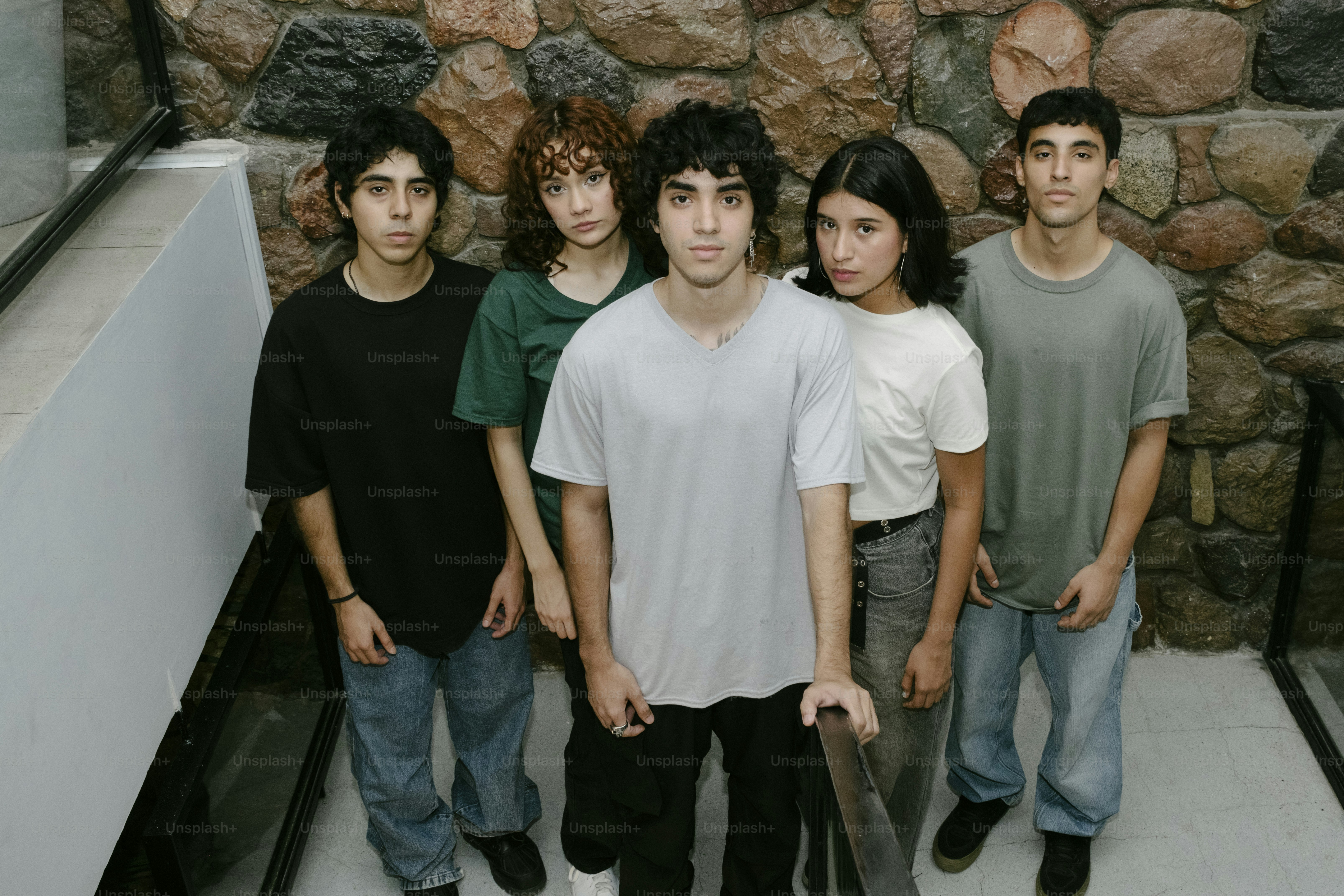 A group of young men standing next to each other