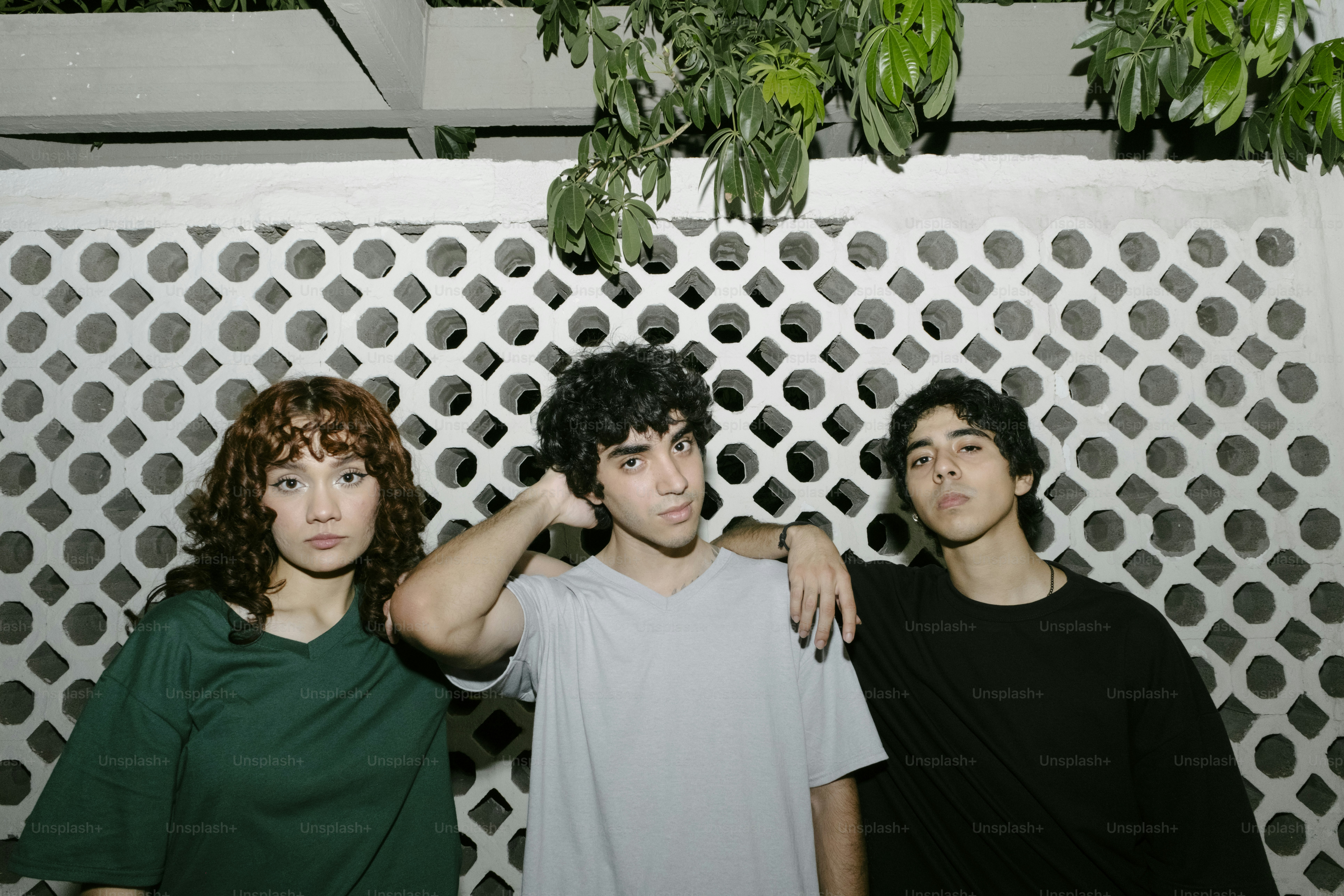 A group of young men standing next to each other