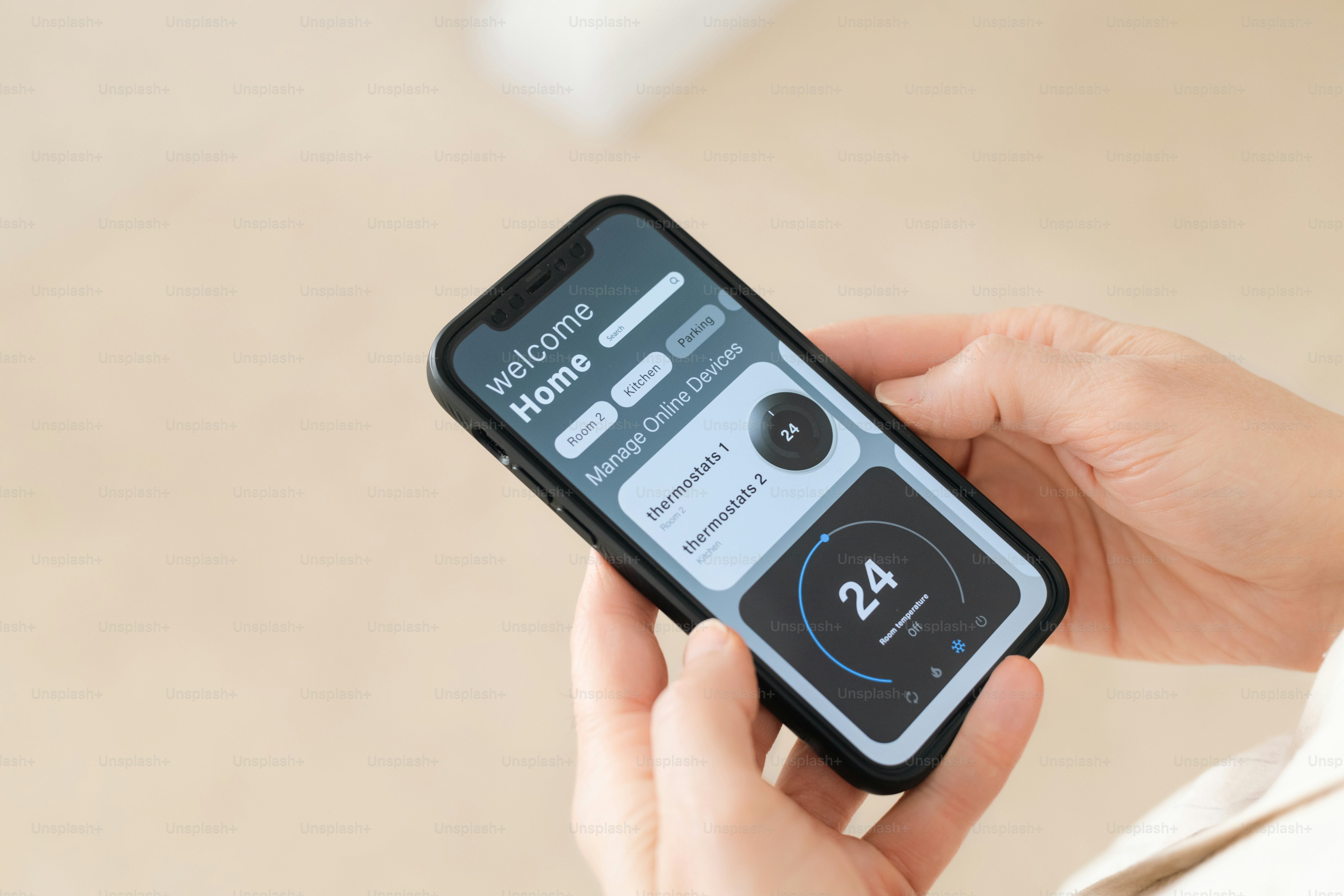 A person holding a cell phone in their hand