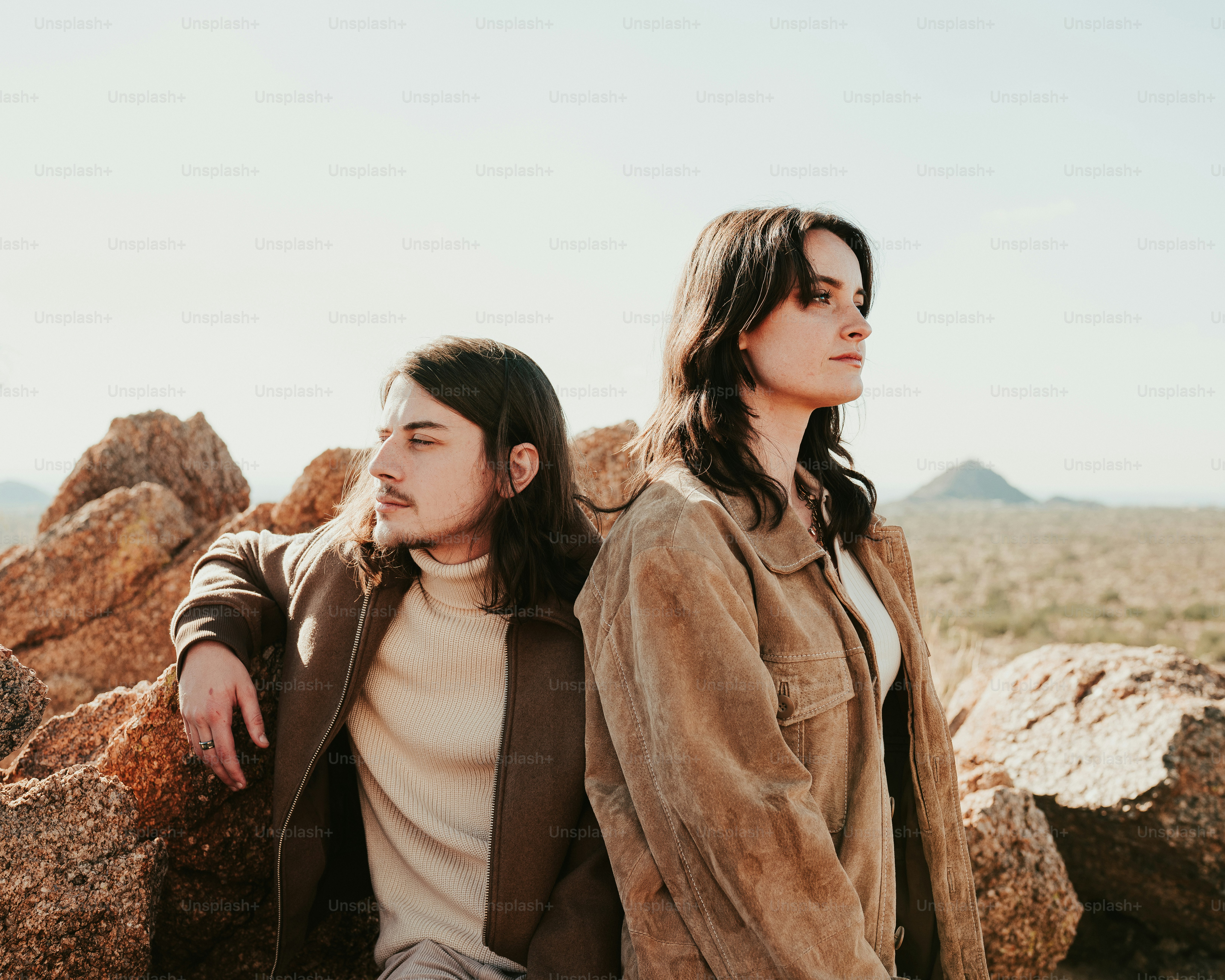 A man and a woman standing next to each other