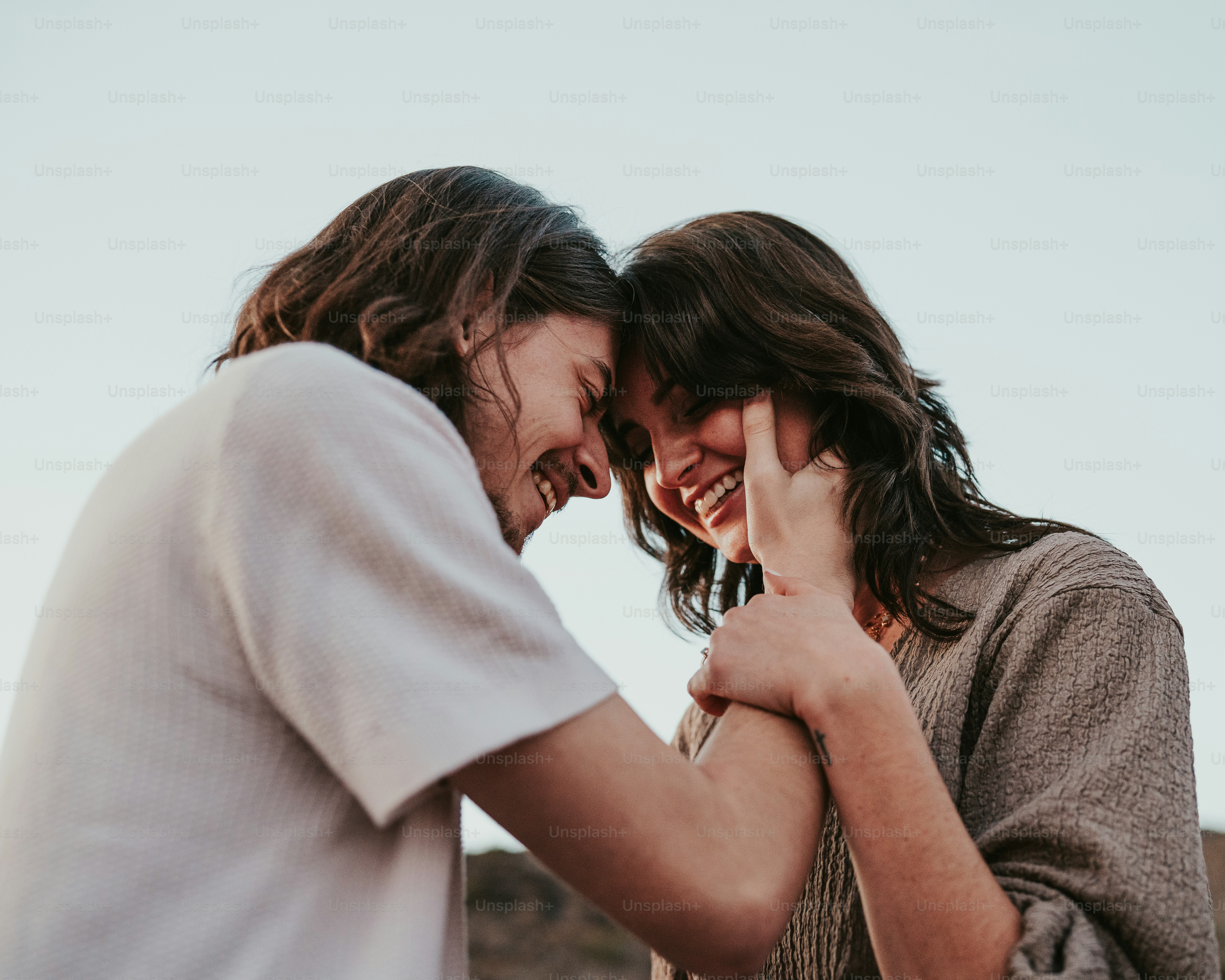 A couple of people standing next to each other