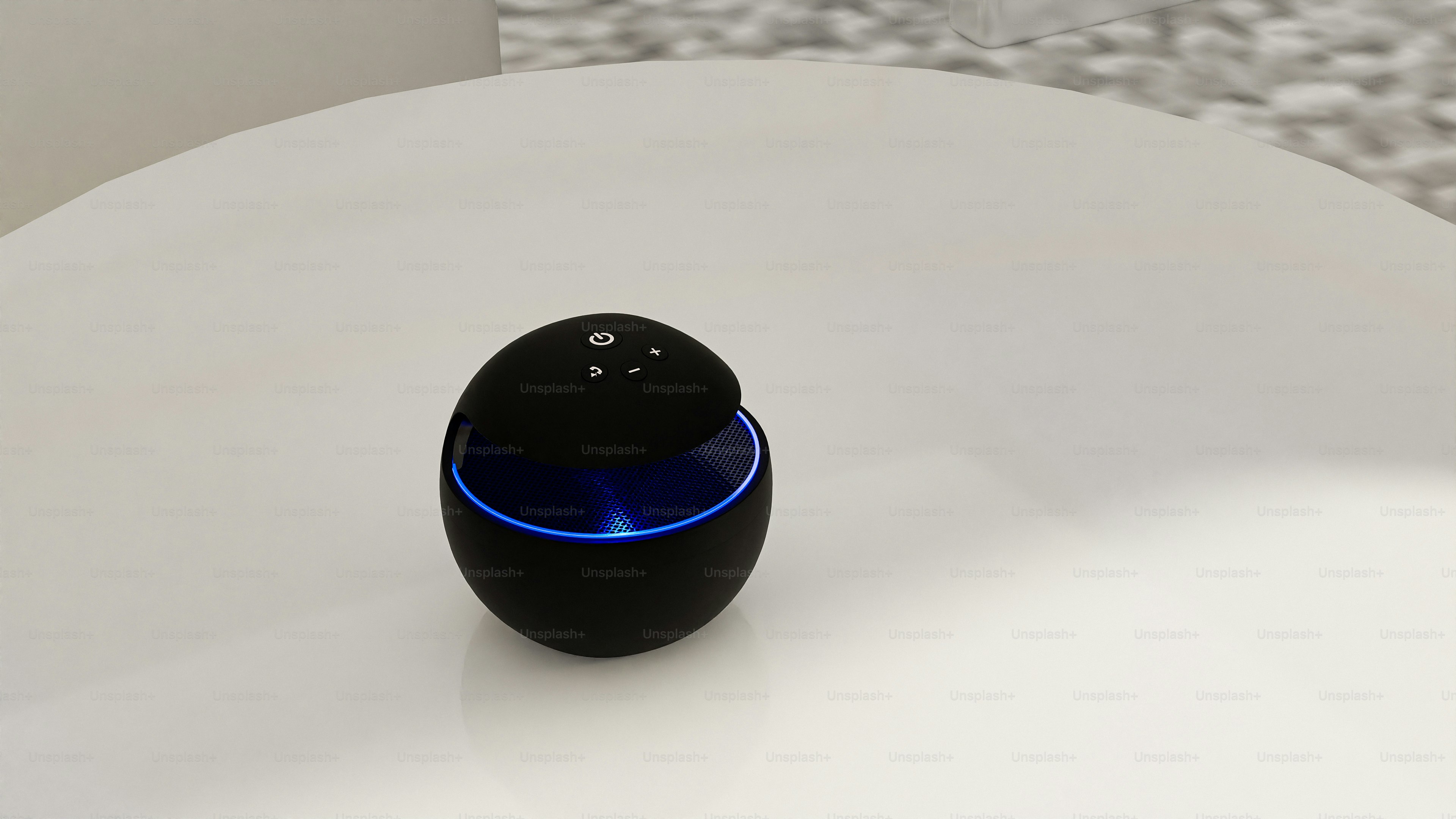 A black object sitting on top of a white table
