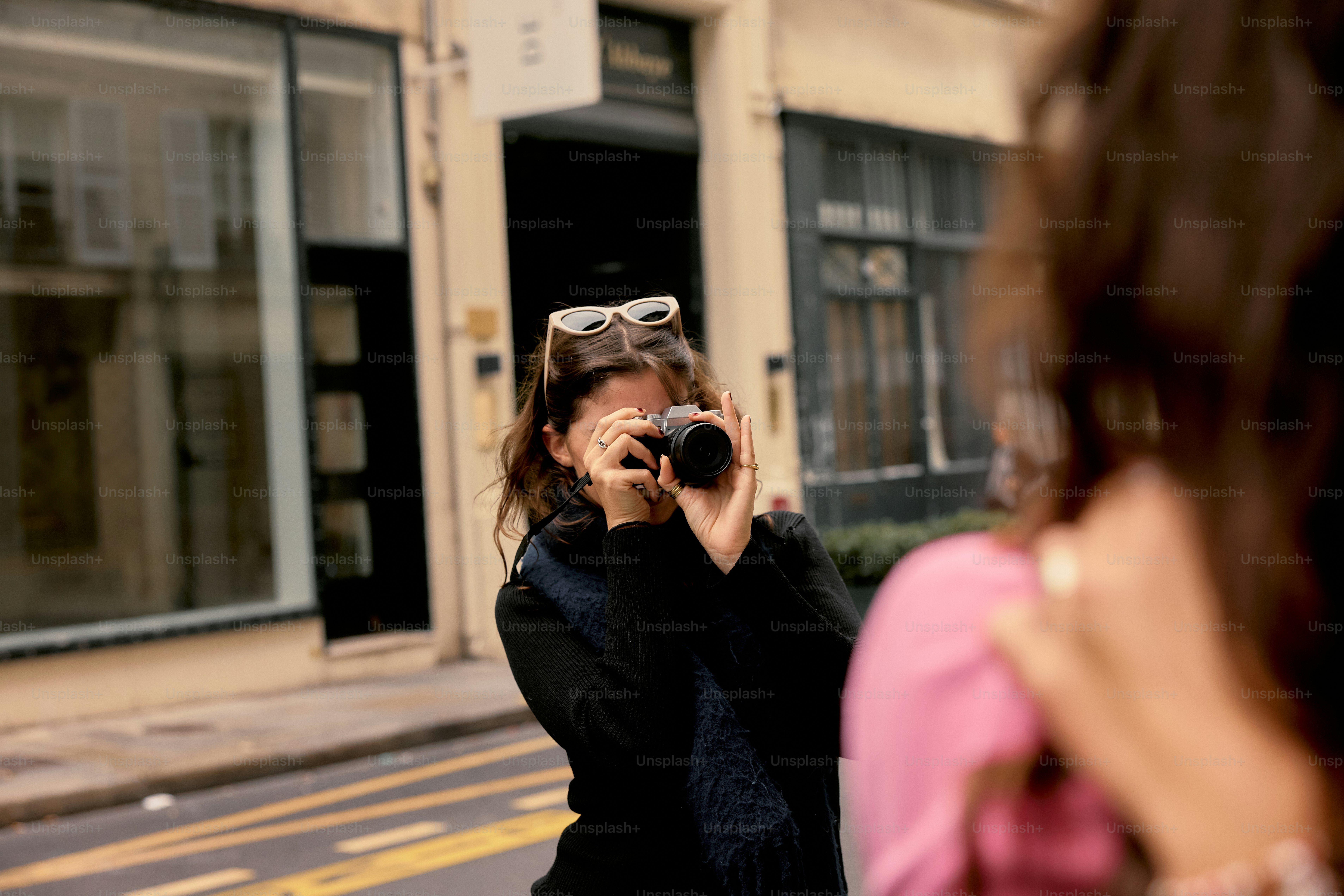 A woman taking a picture of herself in a mirror