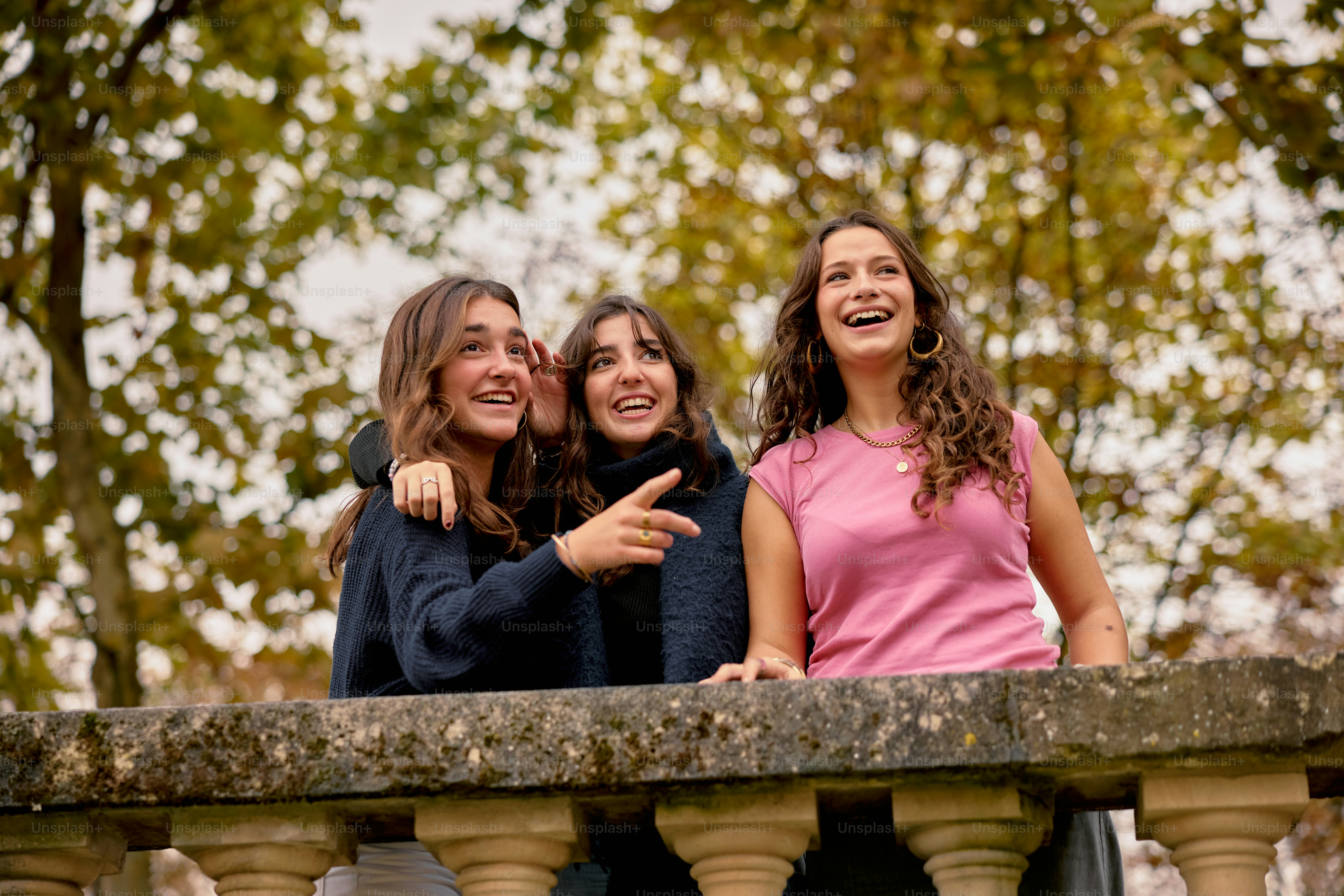A group of young women standing next to each other