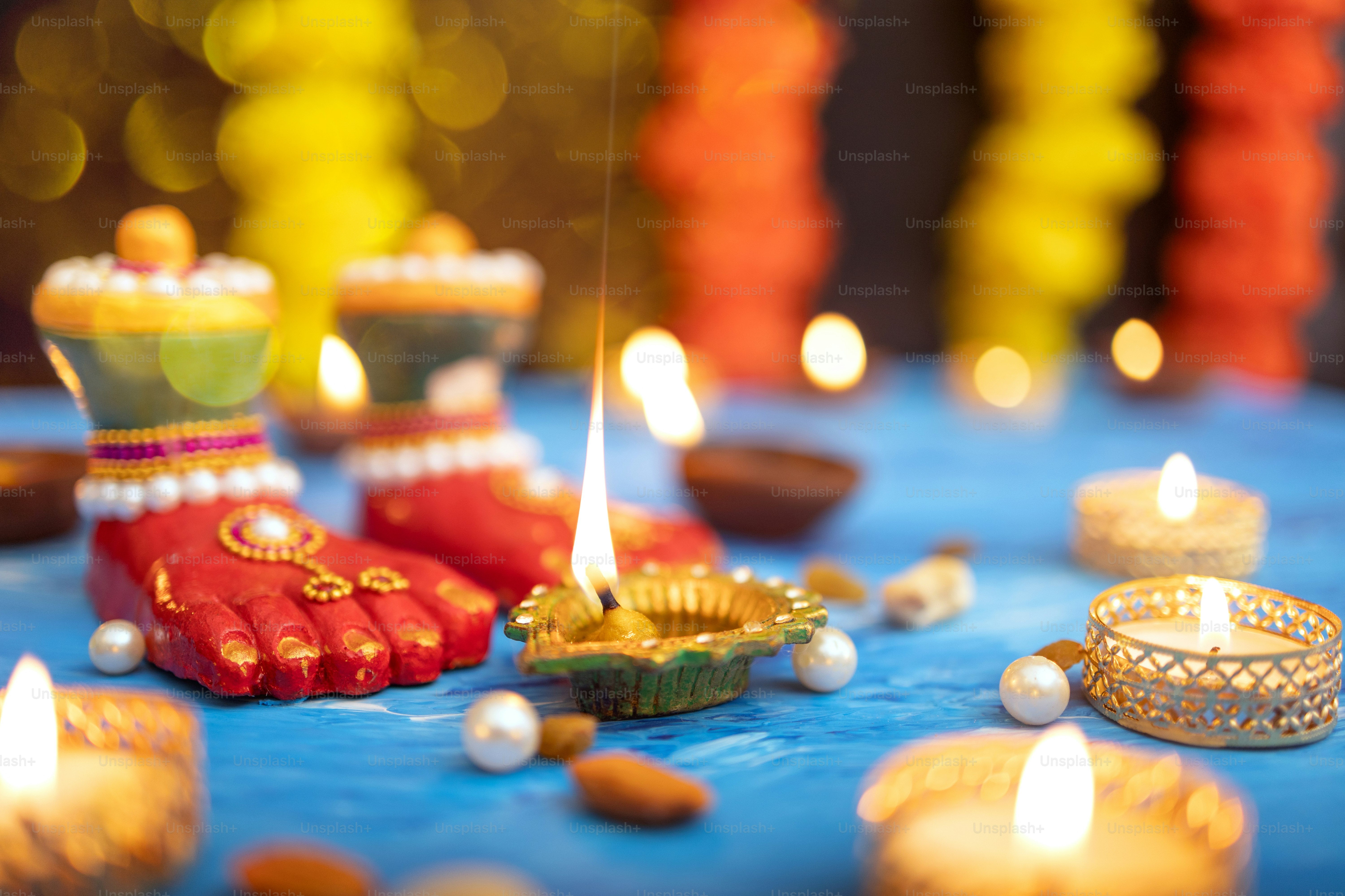 A close up of a table with candles and decorations