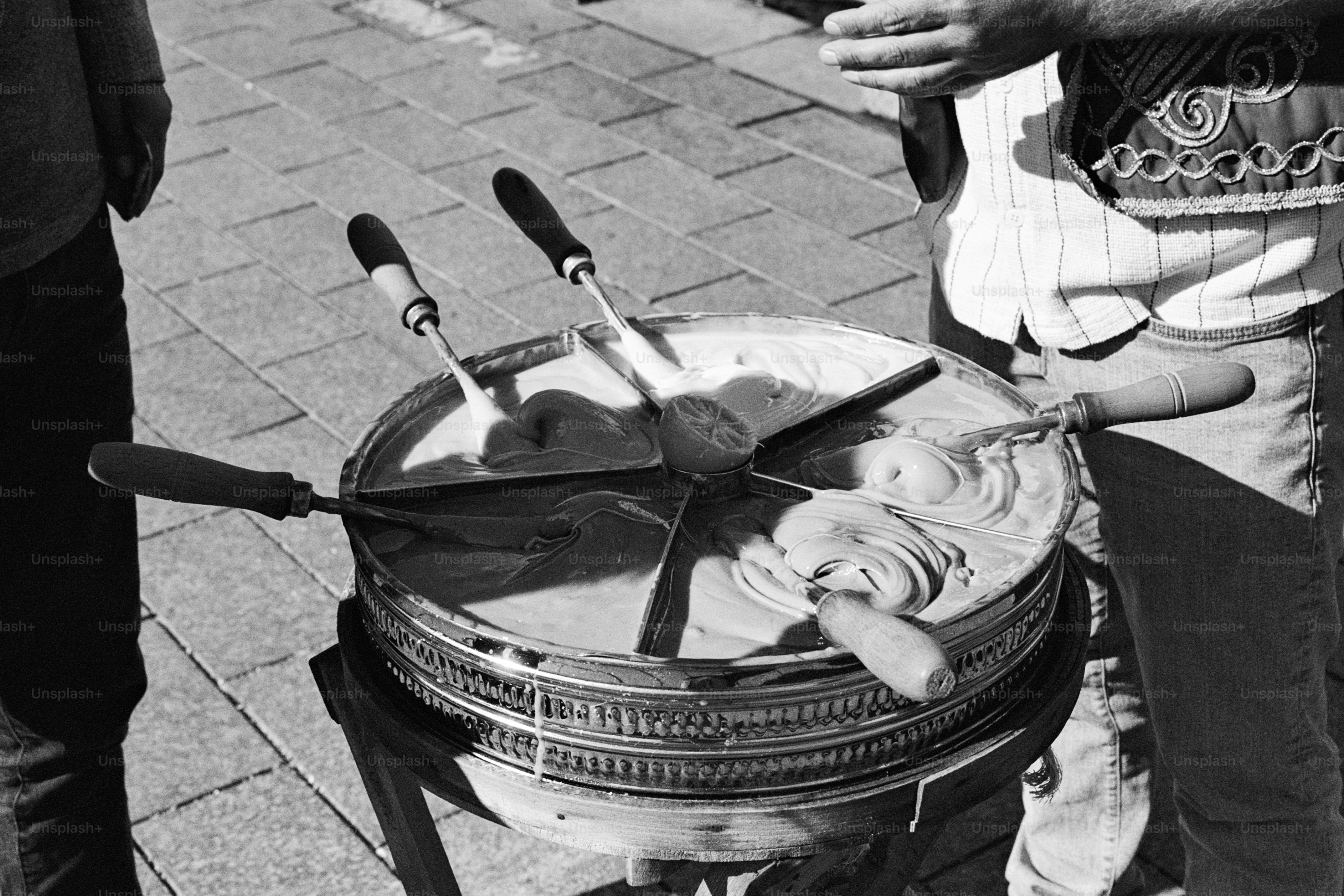A man standing next to a baby in a basket