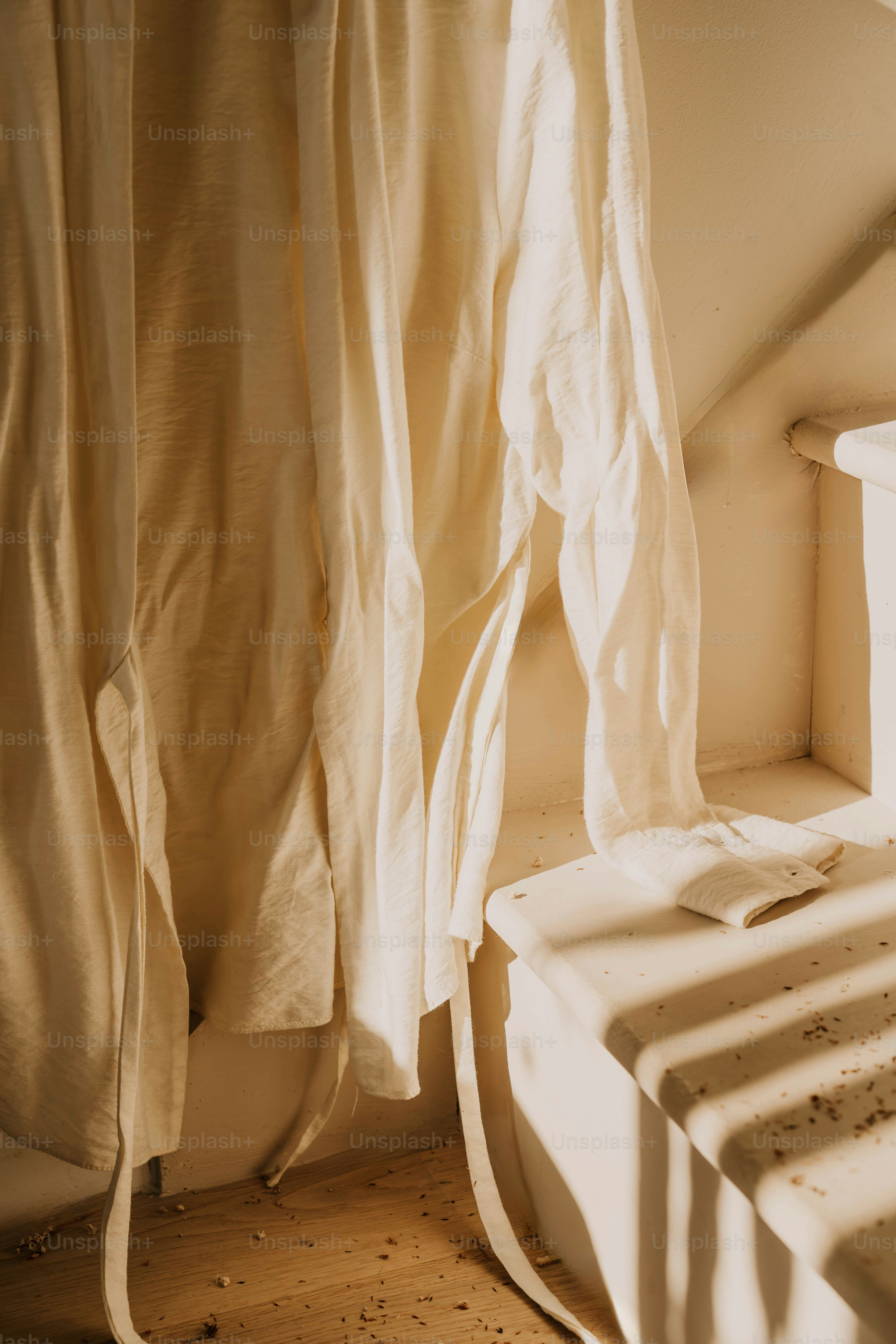 A room with a bed and a window in it