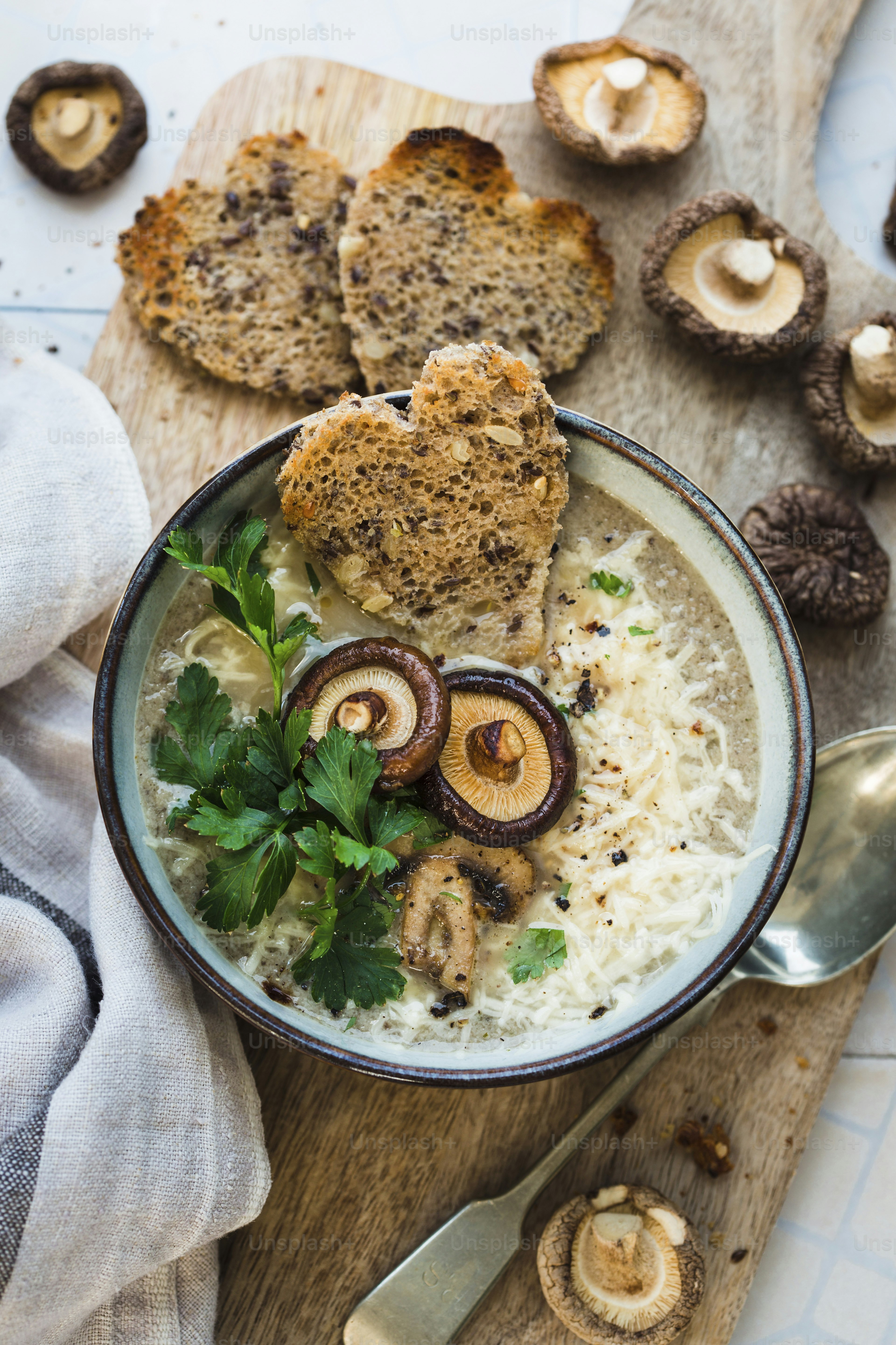 A bowl of food with mushrooms and rice