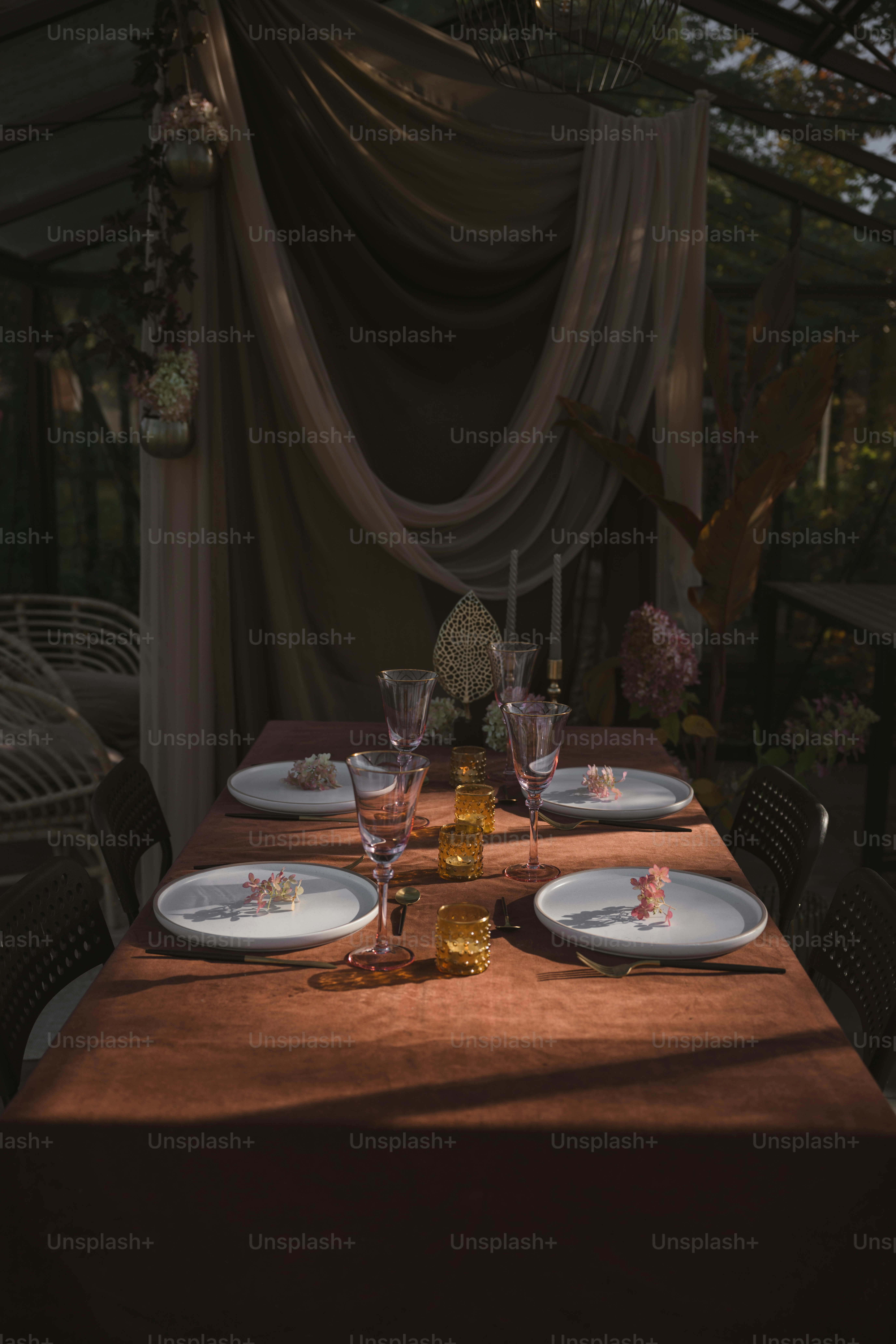 A table with plates and glasses on it