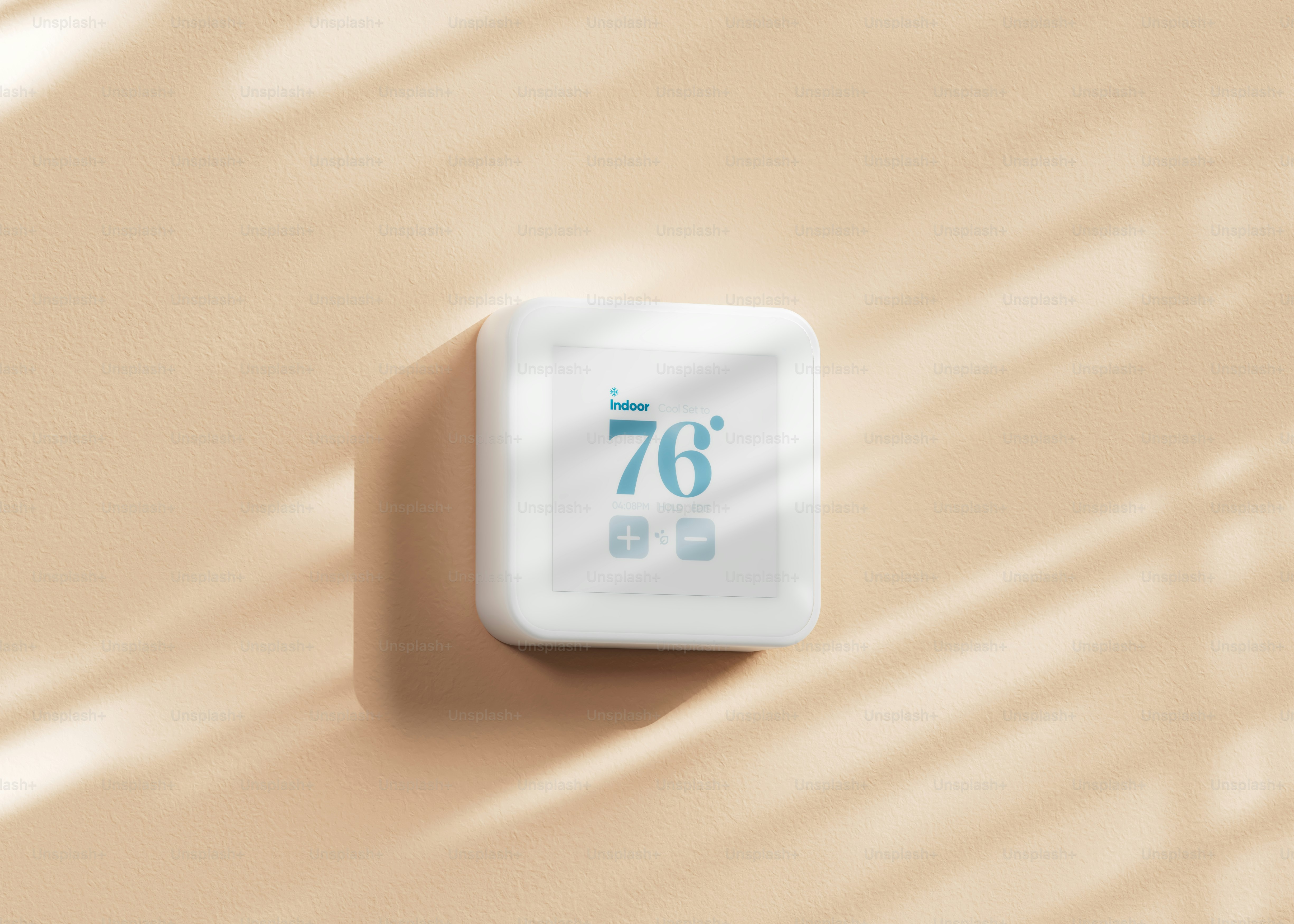 壁のサーモスタイヤーのクローズアップ