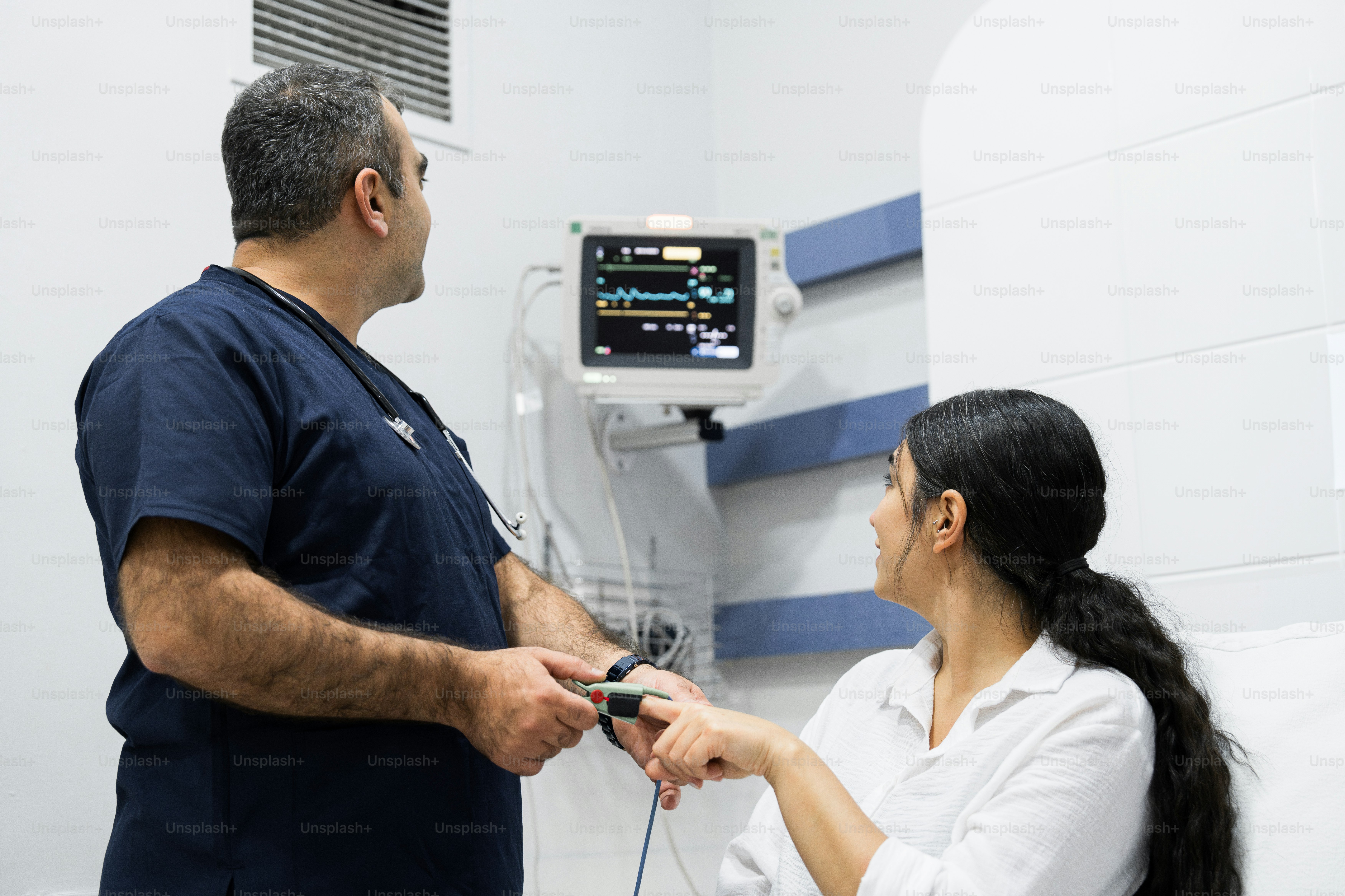 A man and a woman in a hospital room