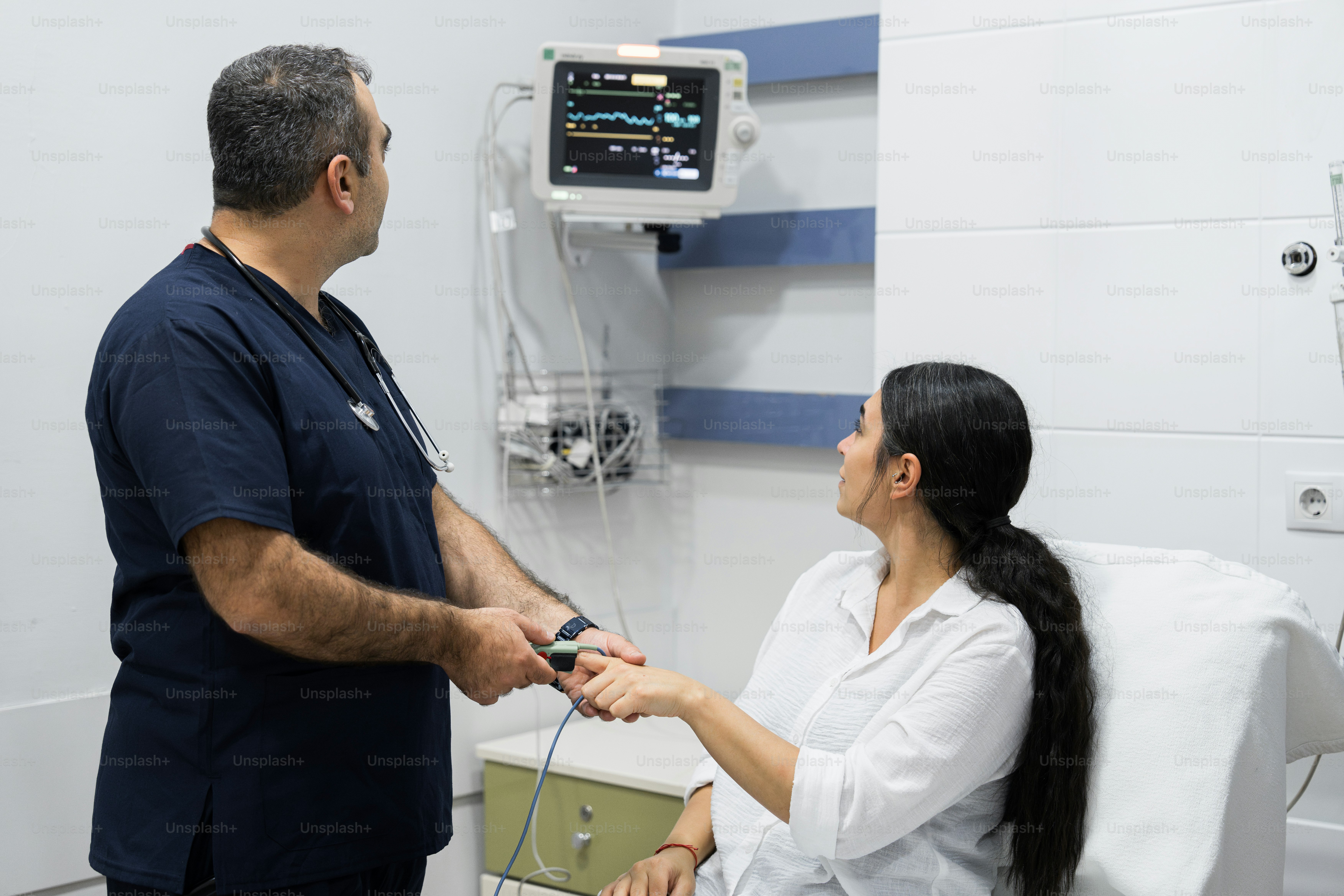 A man and a woman in a hospital room