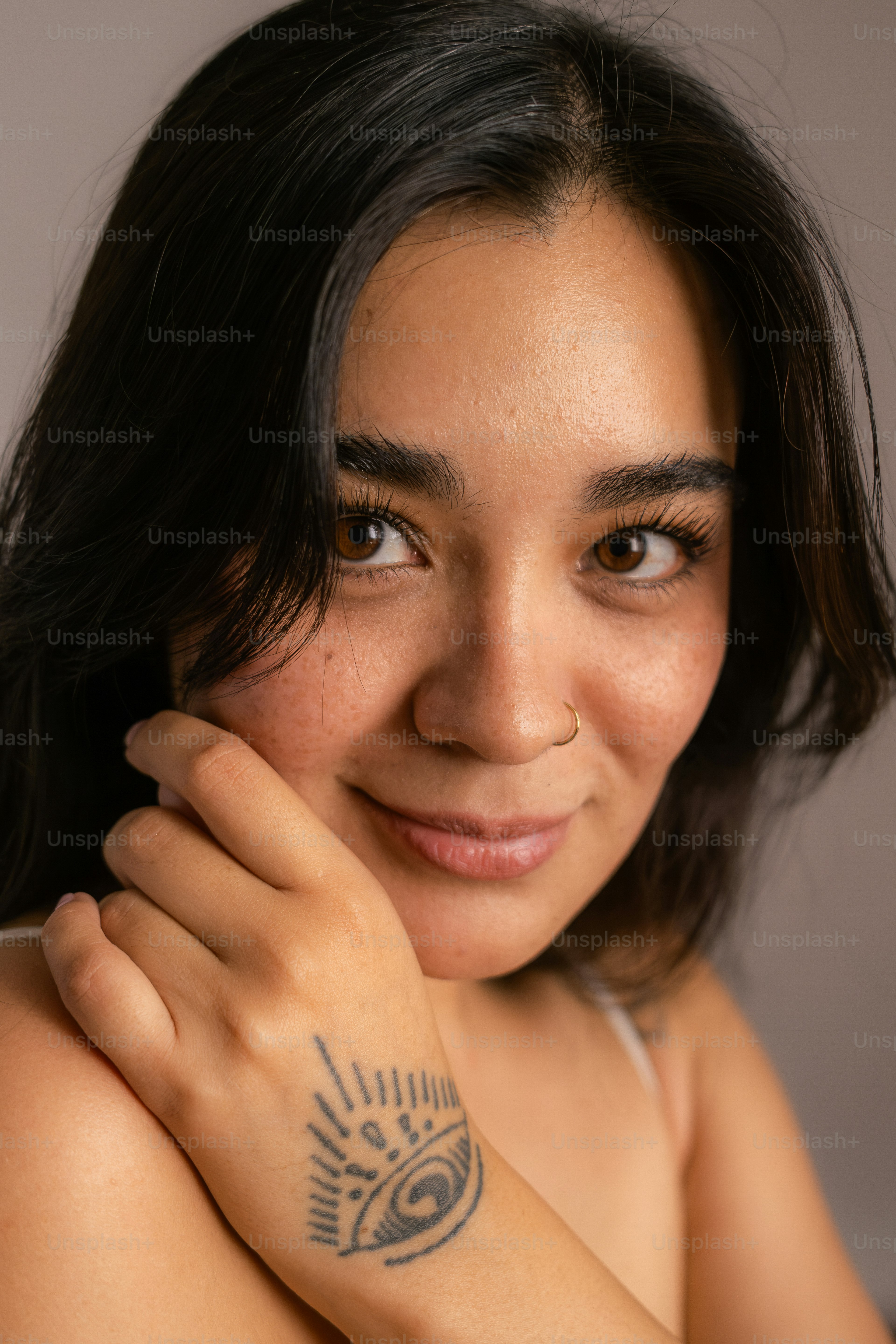 A woman with a tattoo on her arm